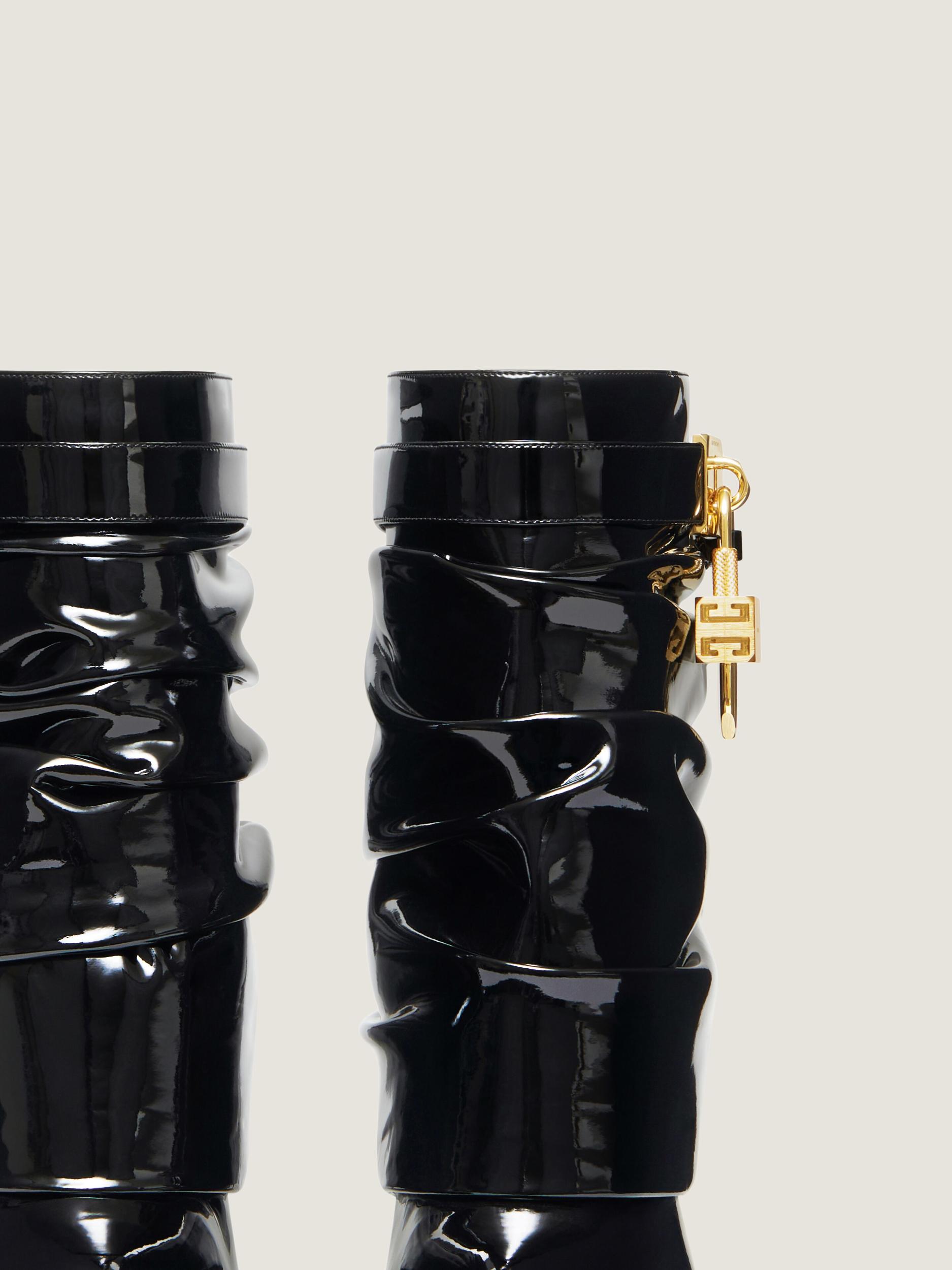 Shark Lock Stiletto ankle boots in latex Product Image