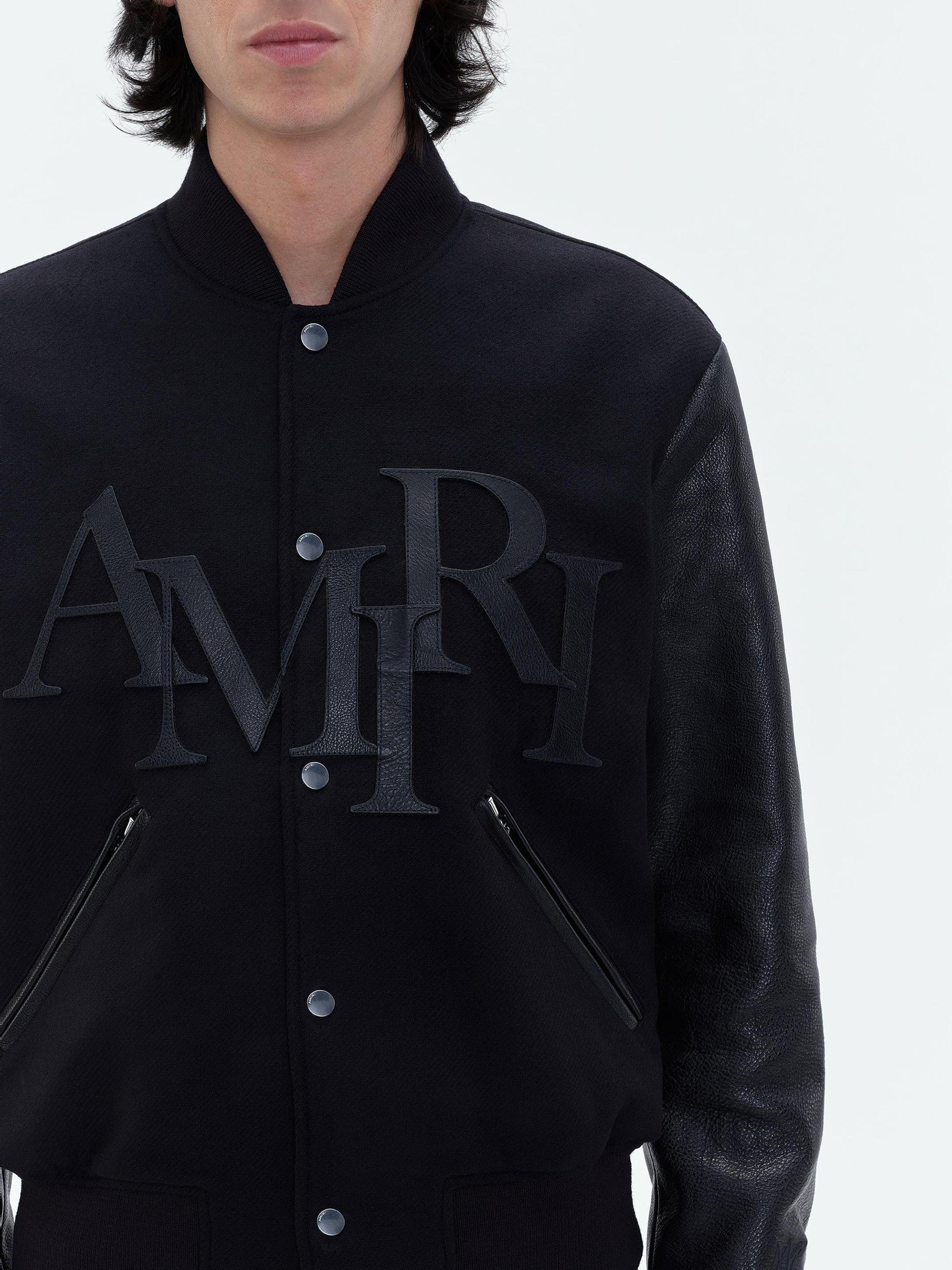 AMIRI STAGGERED VARSITY JACKET - Black Product Image