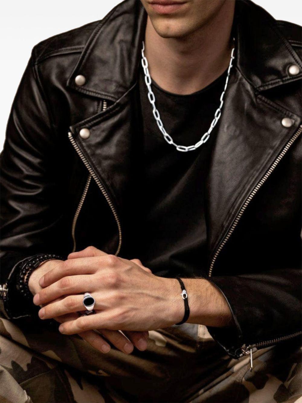 Fleur-de-Lis embossed cord bracelet Product Image