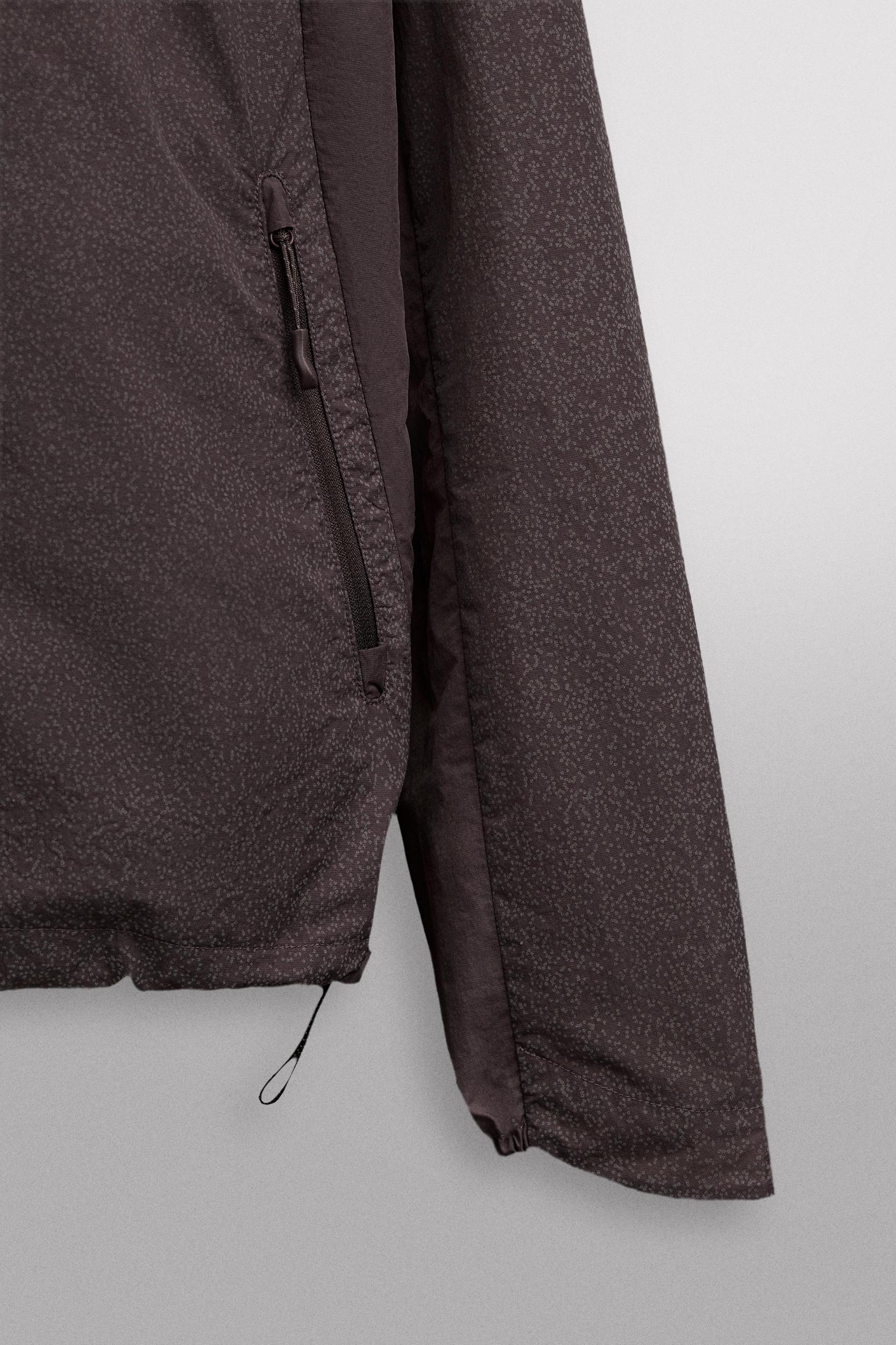 REFLECTIVE WINDBREAKER JACKET Product Image