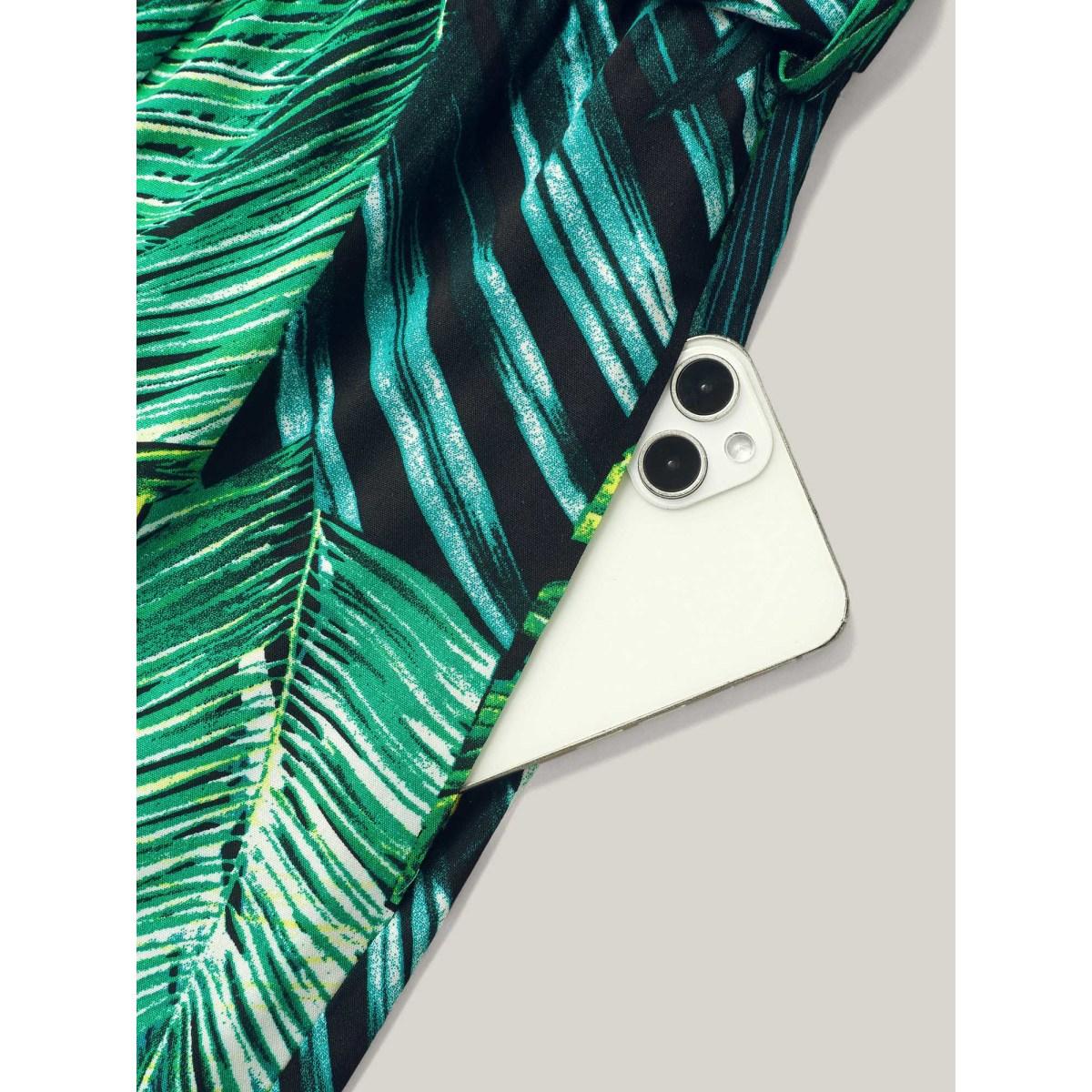 Plus Size BlackFlower Tropical Leaf Print Stretchy Belted Slit Jumpsuit Women Resort Sleeveless Overlap Collar Vacation Loose Jumpsuits BloomChic 26/4X Product Image