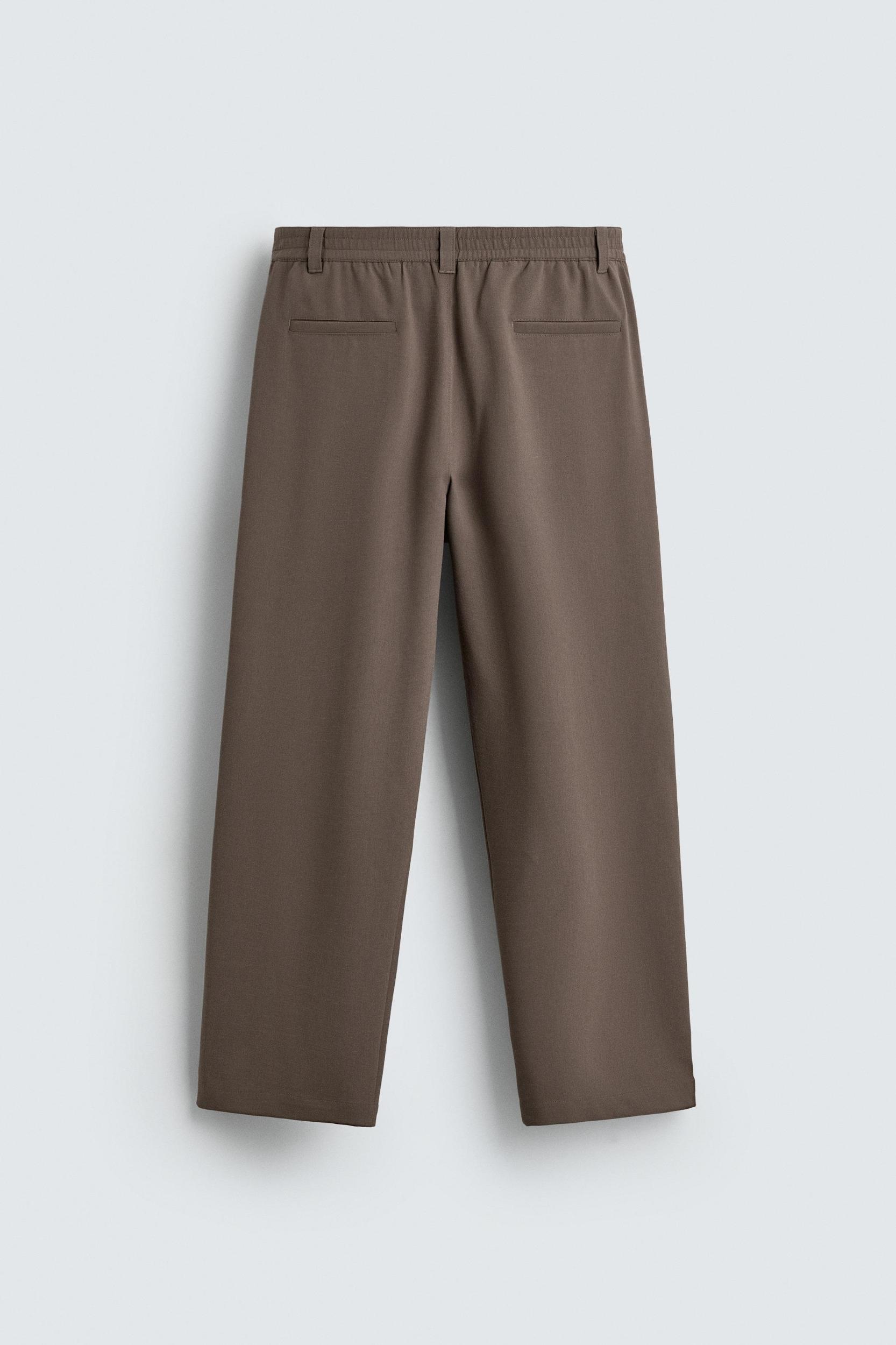 RELAXED FIT PLEATED PANTS Product Image