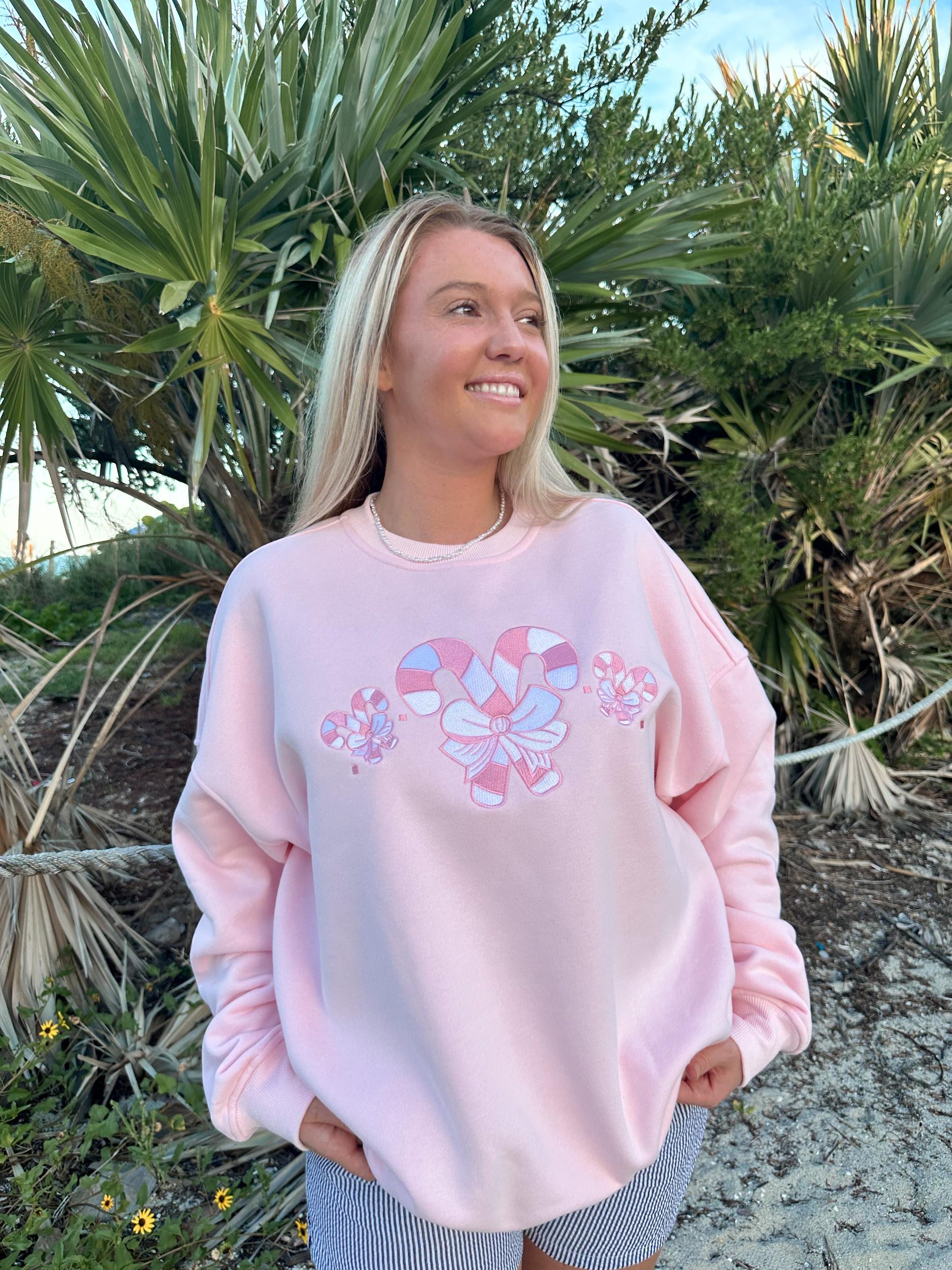 Light Pink Candy Cane Wonderland Sweatshirt Product Image