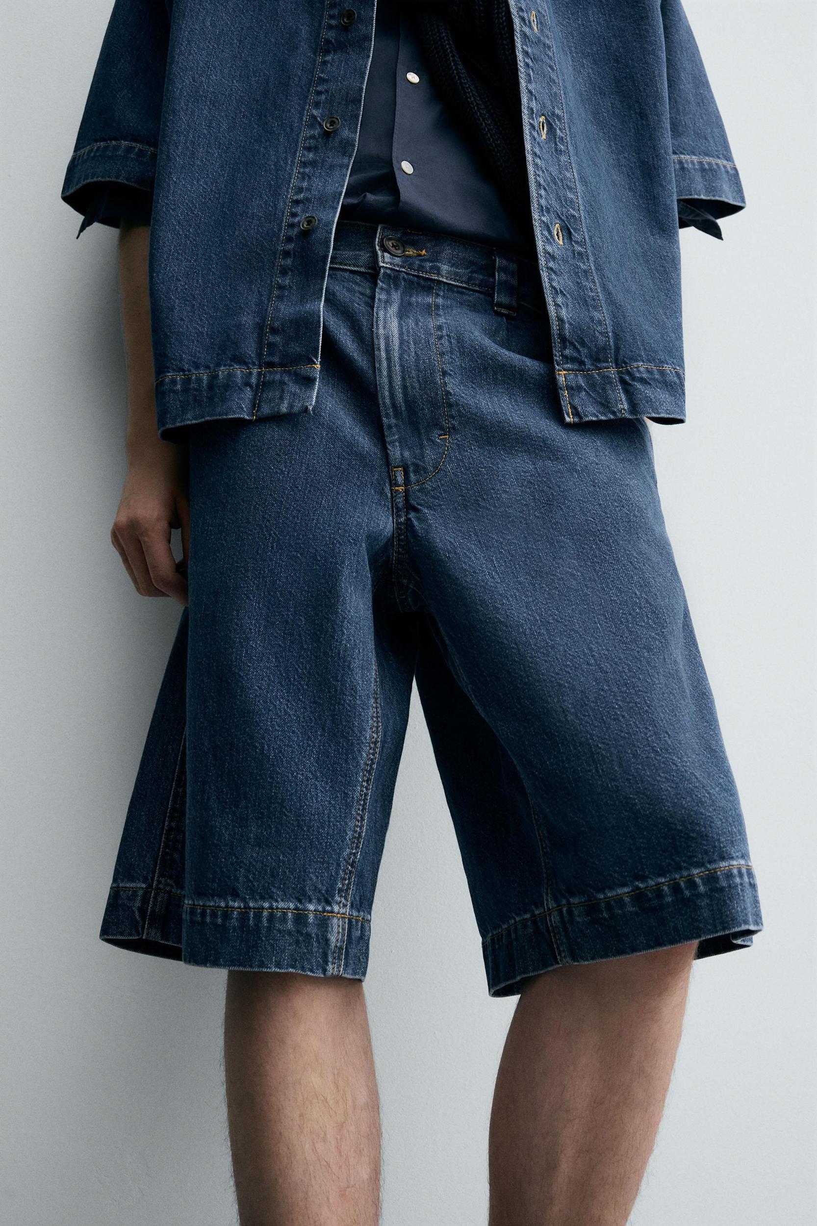 PLEATED RELAXED FIT DENIM SHORTS Product Image