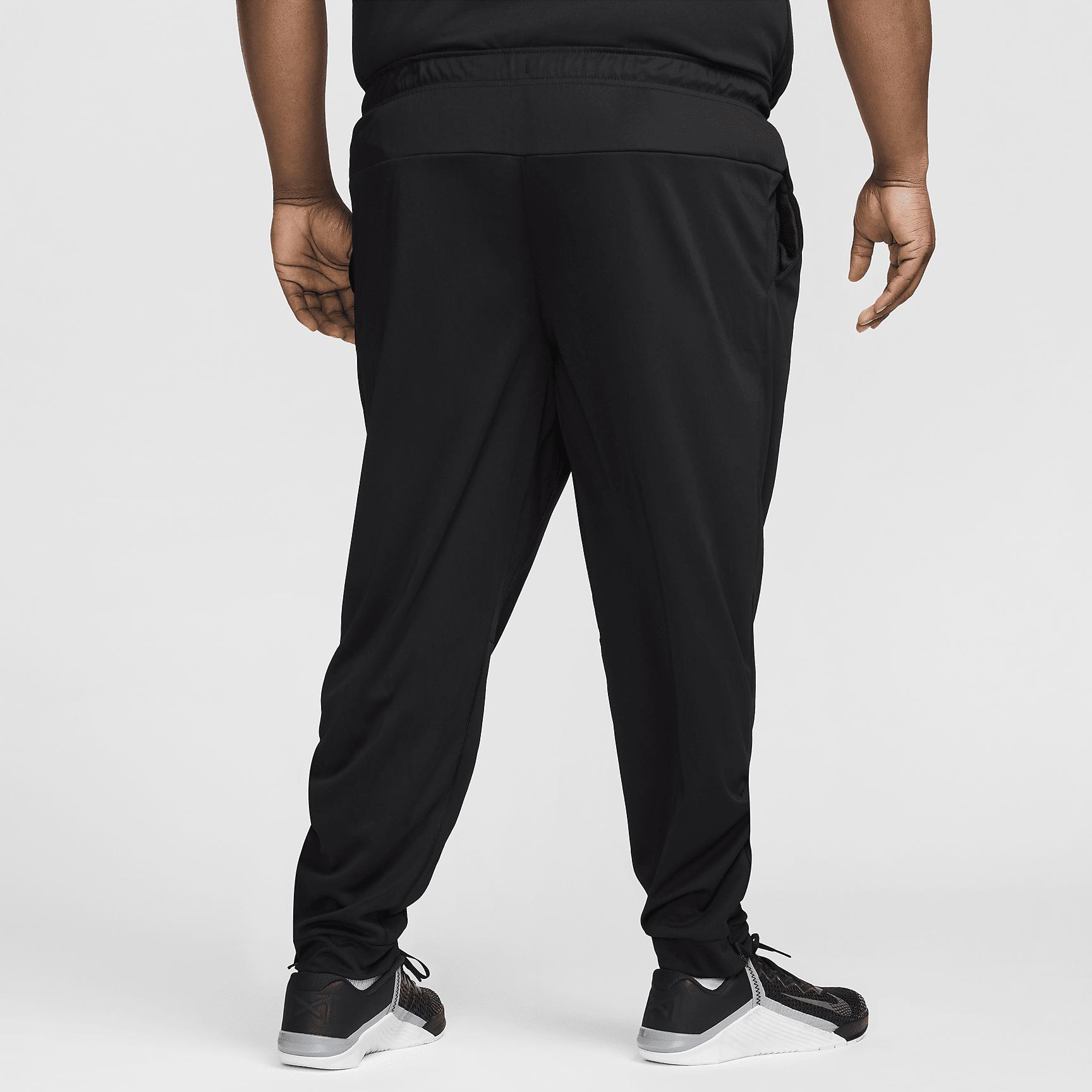 Nike Mens Totality Dri-FIT Tapered Versatile Pants | FB7509-010 Product Image