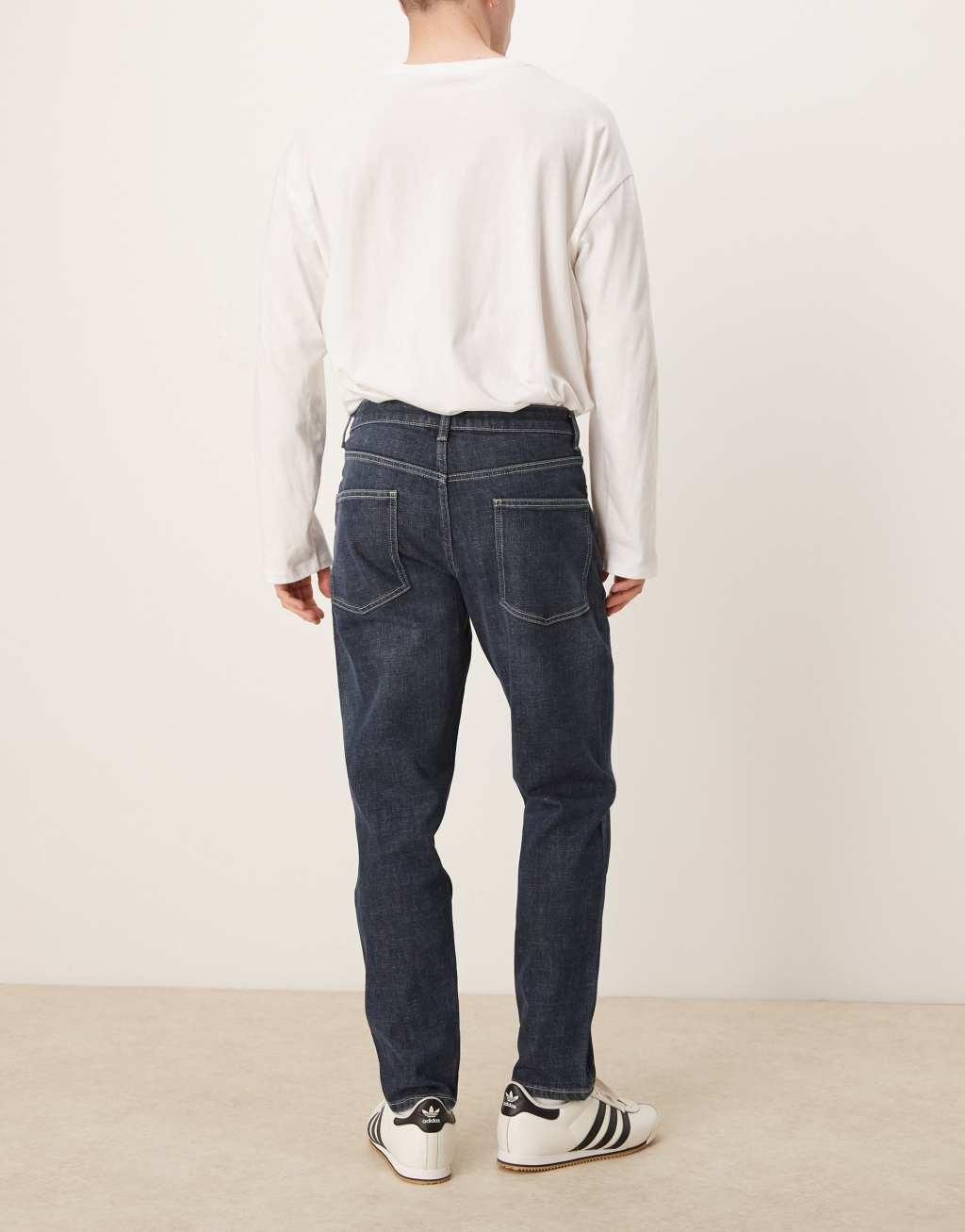 ASOS DESIGN stretch tapered jeans in dark wash blue Product Image