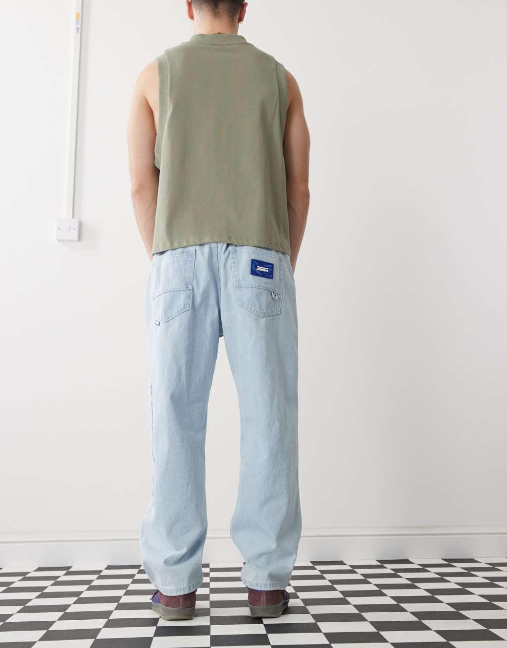 AAPE by A Bathing Ape loose fit logo jeans in light wash Product Image