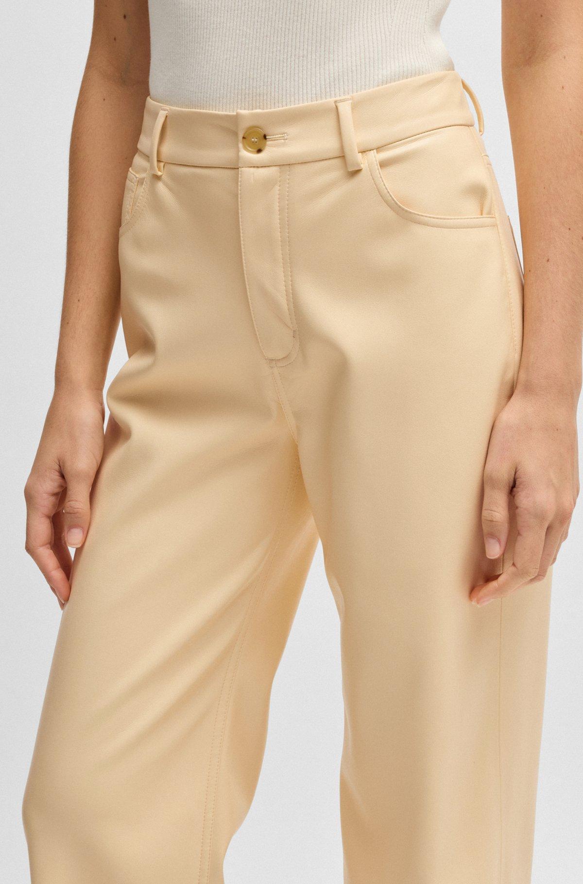 Five-pocket trousers in faux leather Product Image