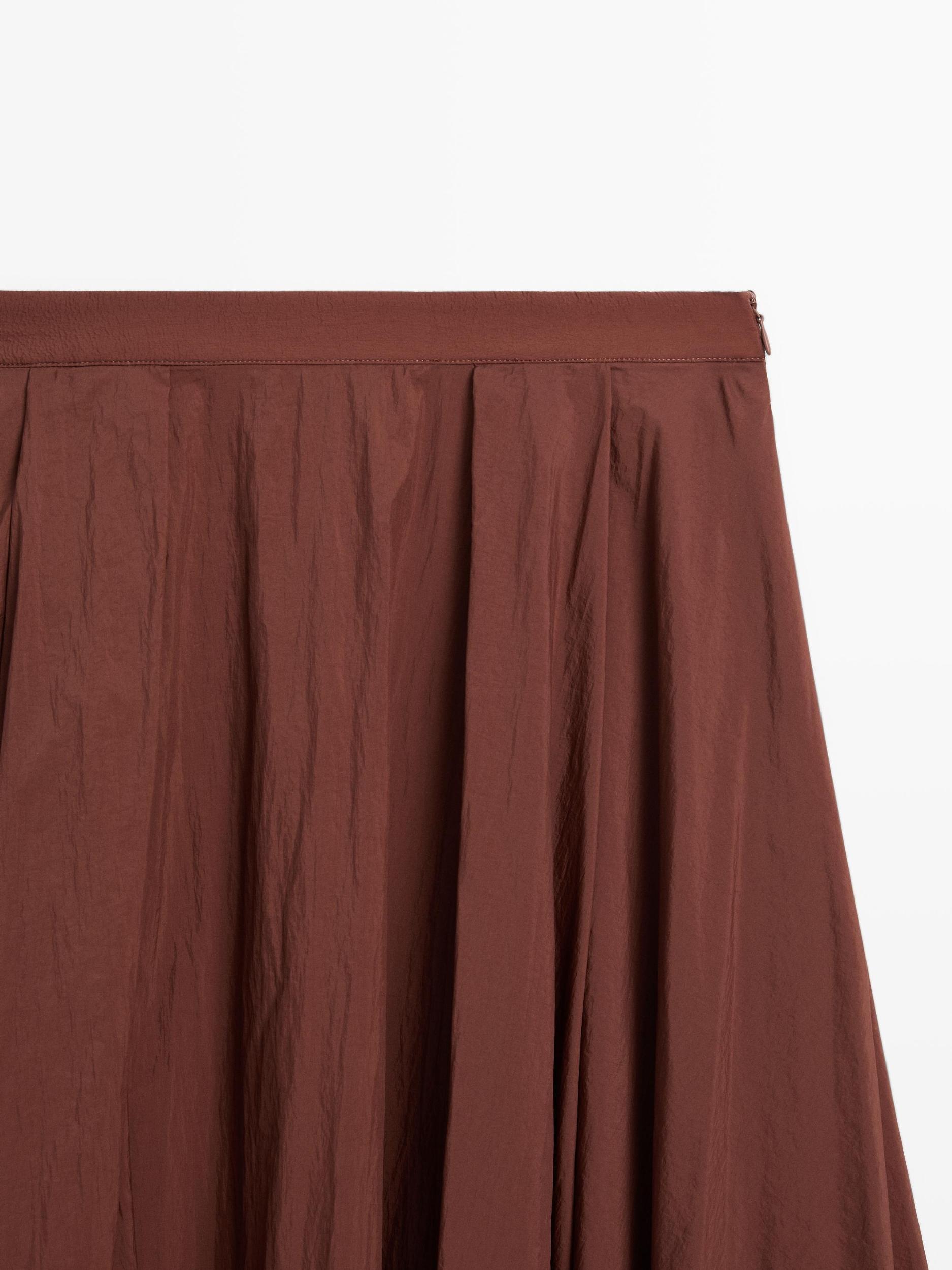 Pleated technical midi skirt Product Image