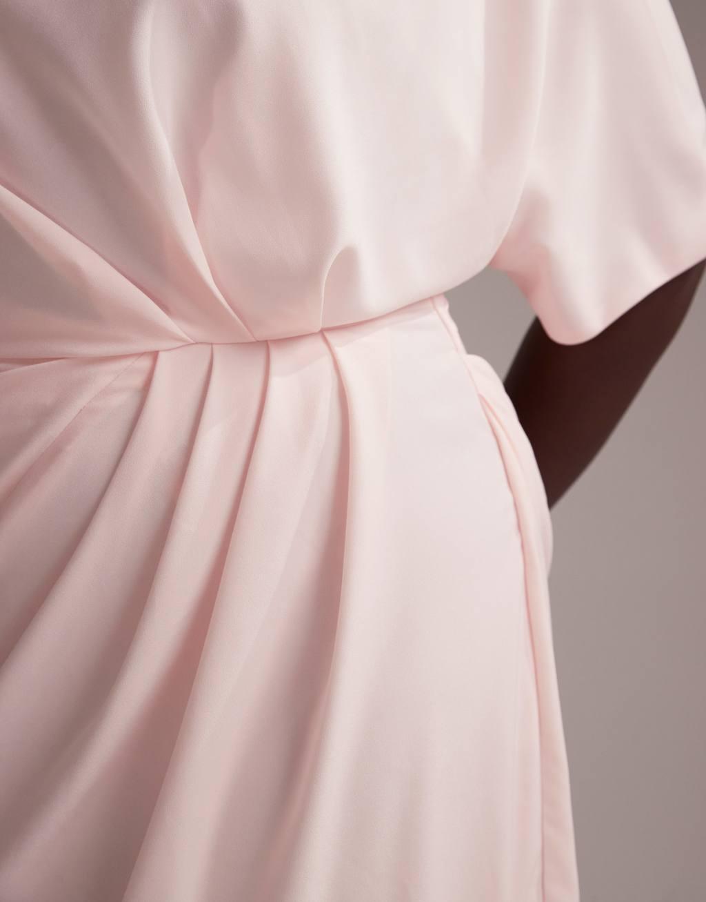 ASOS DESIGN Curve Bridesmaids slash neck crepe t-shirt sleeve minimal drape maxi dress in soft pink Product Image