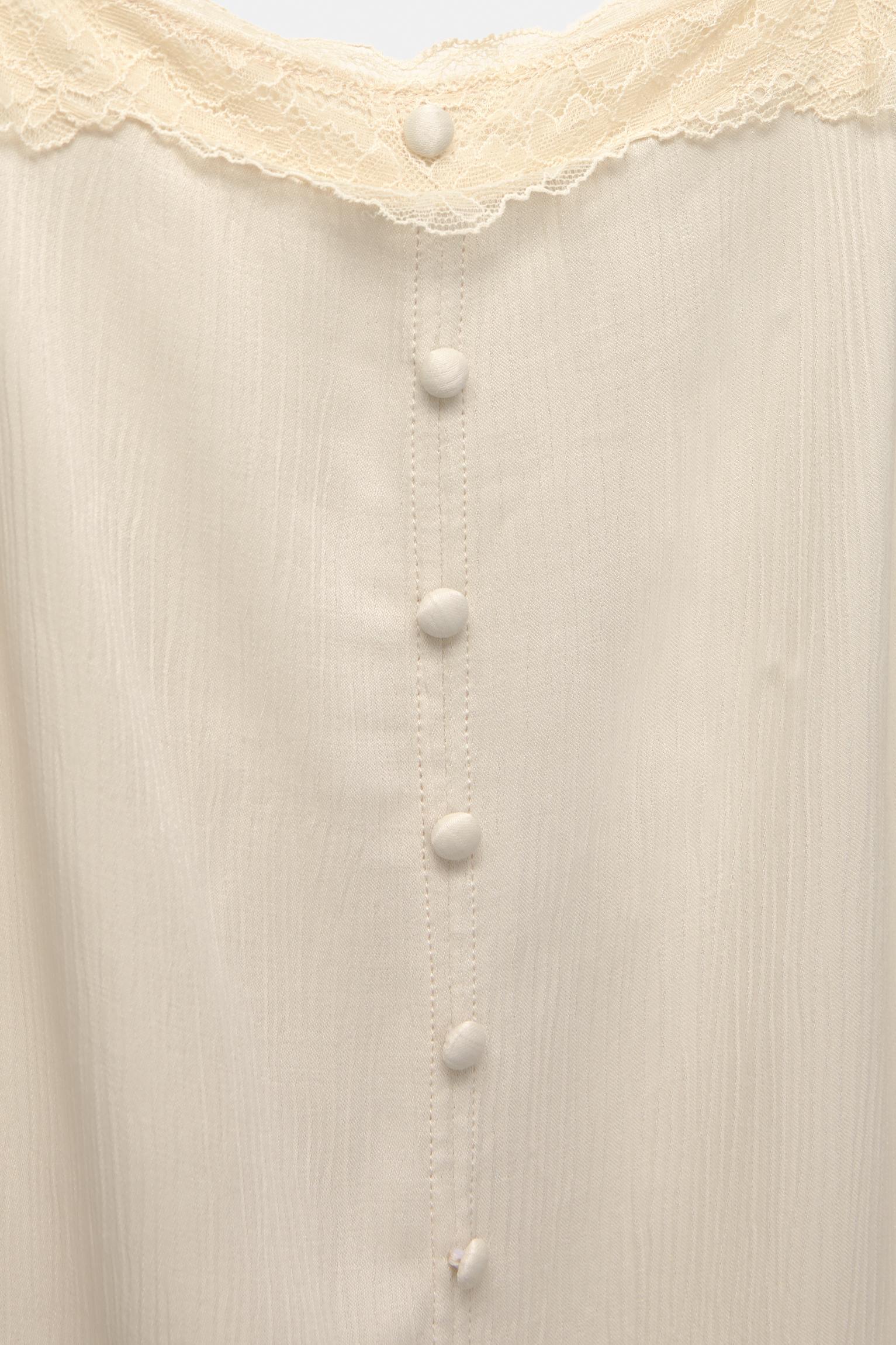 Strappy lace-trimmed camisole top Product Image