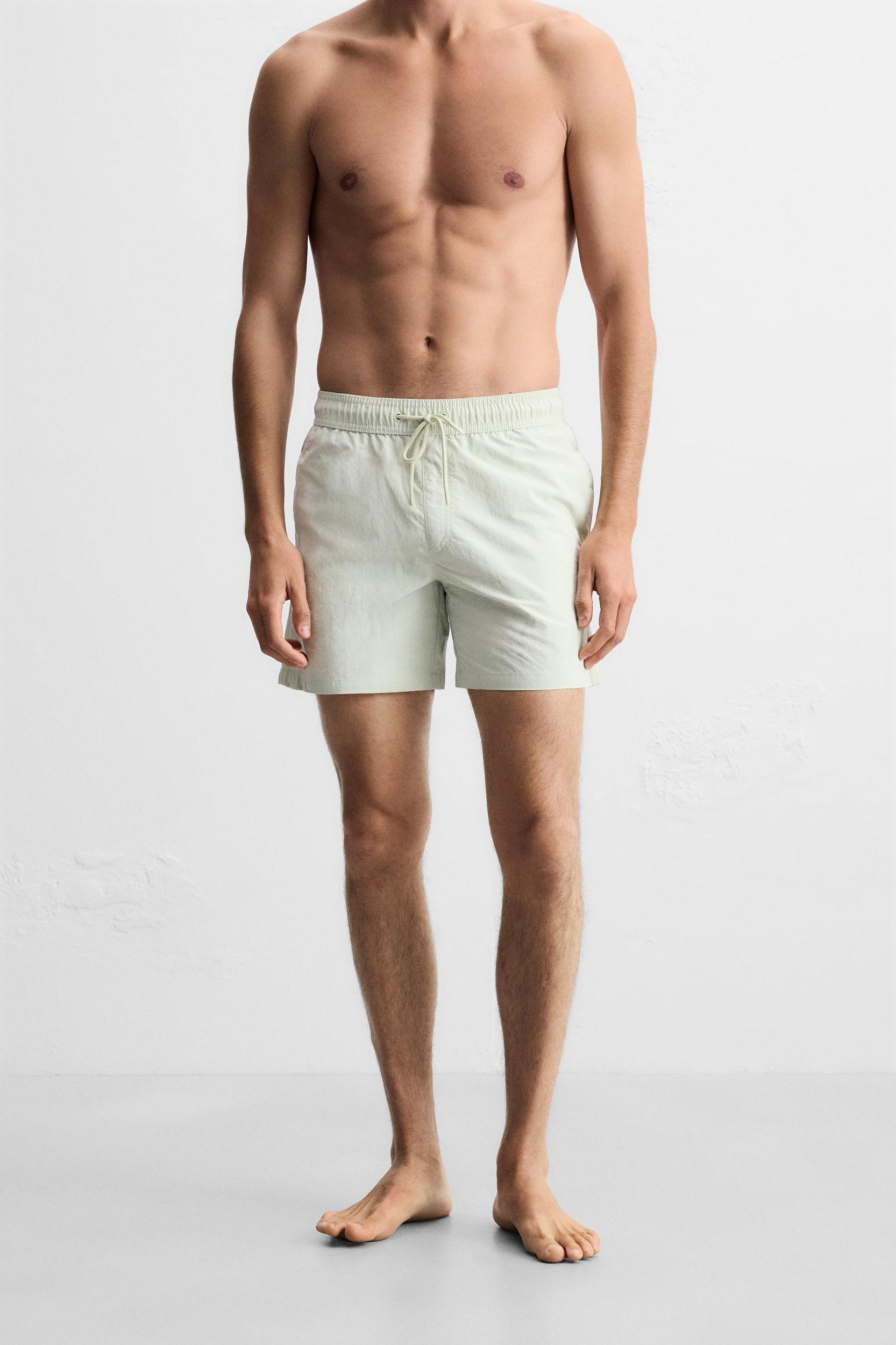 CONTRAST BANDS MID-LENGTH SWIMSUIT Product Image