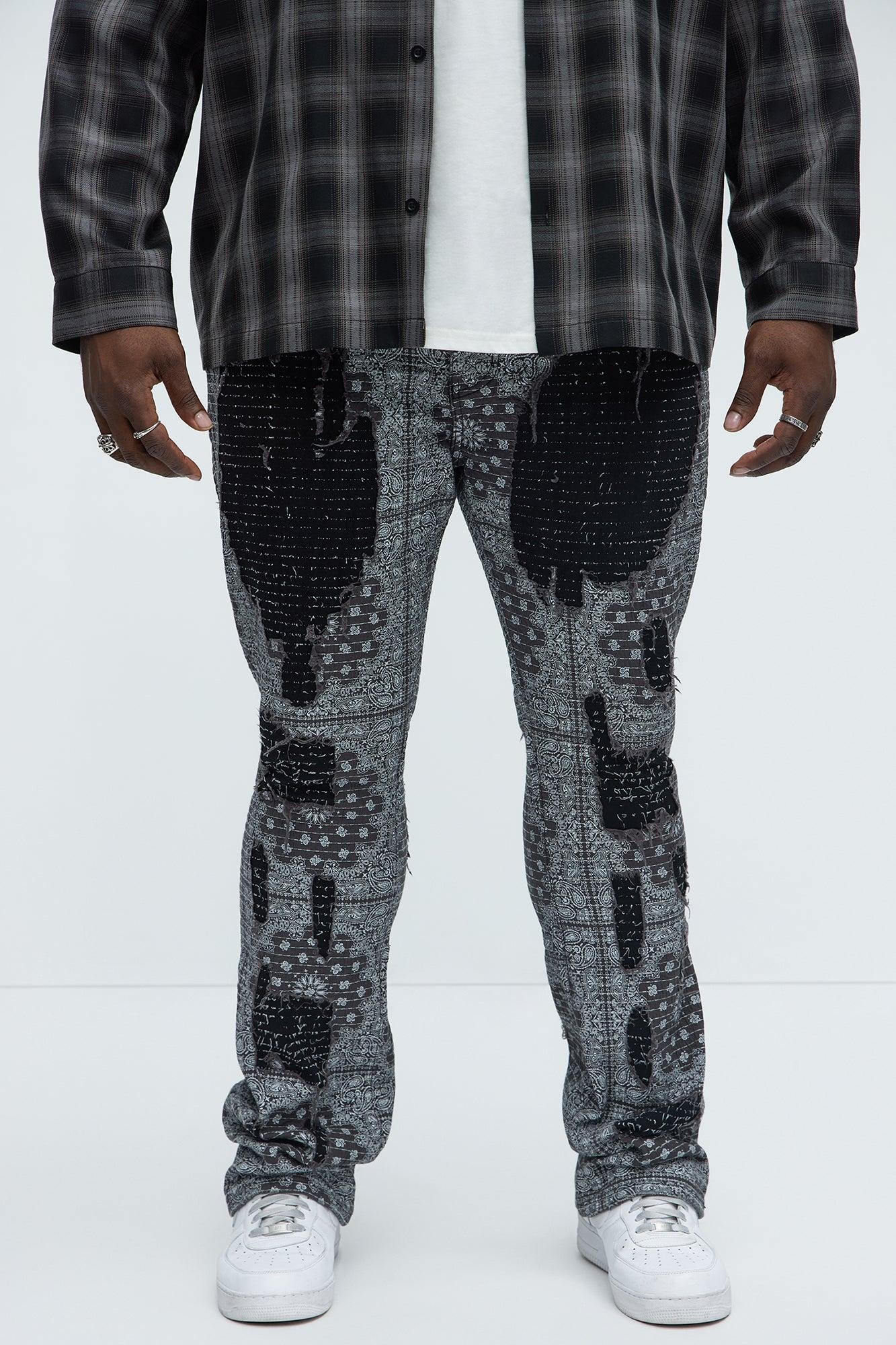 Shredded Shock Distressed Stacked Skinny Flare Jeans - Black Product Image