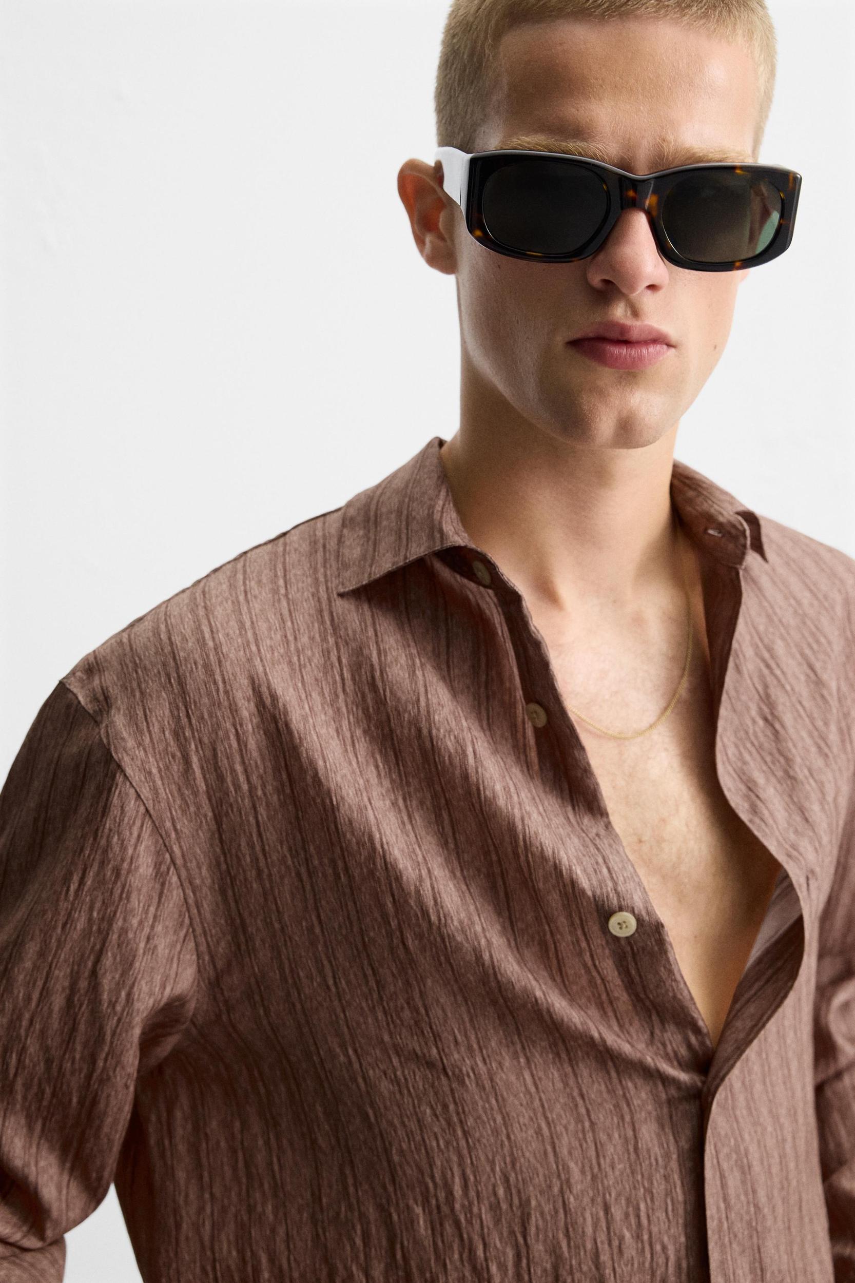 STRIPED FLOWY SHIRT Product Image