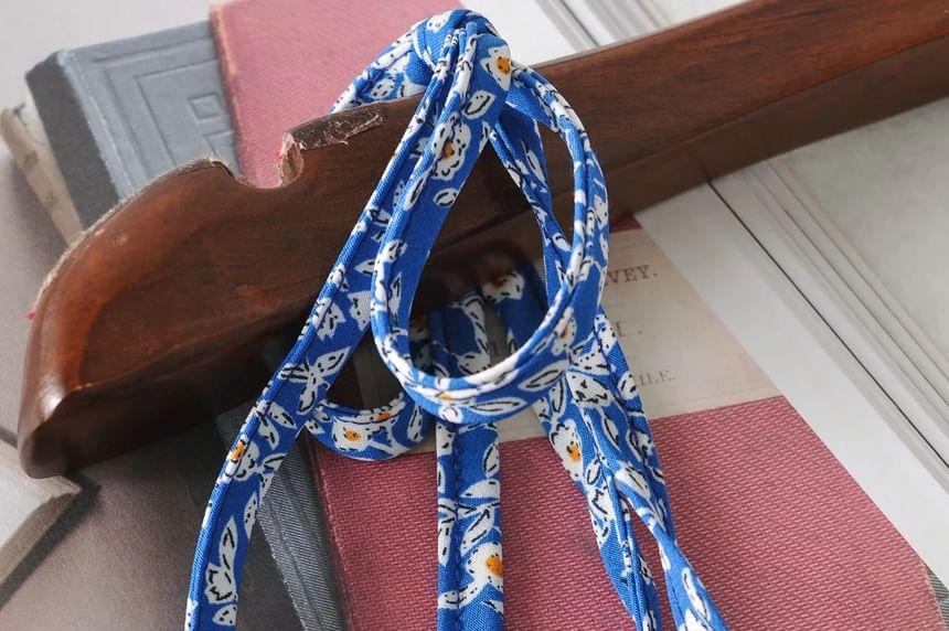 Spaghetti Strap Floral Ruffle Tie-Waist Romper Product Image