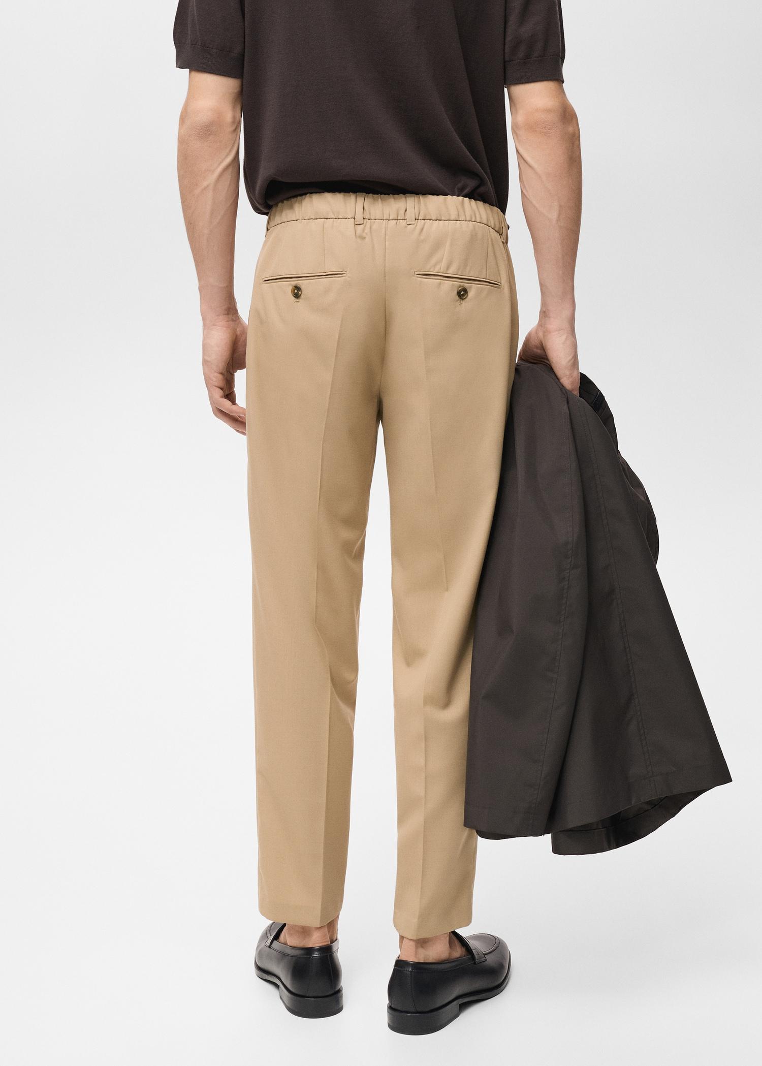 Slim-fit pleated cool wool pants - Men | MANGO USA Product Image