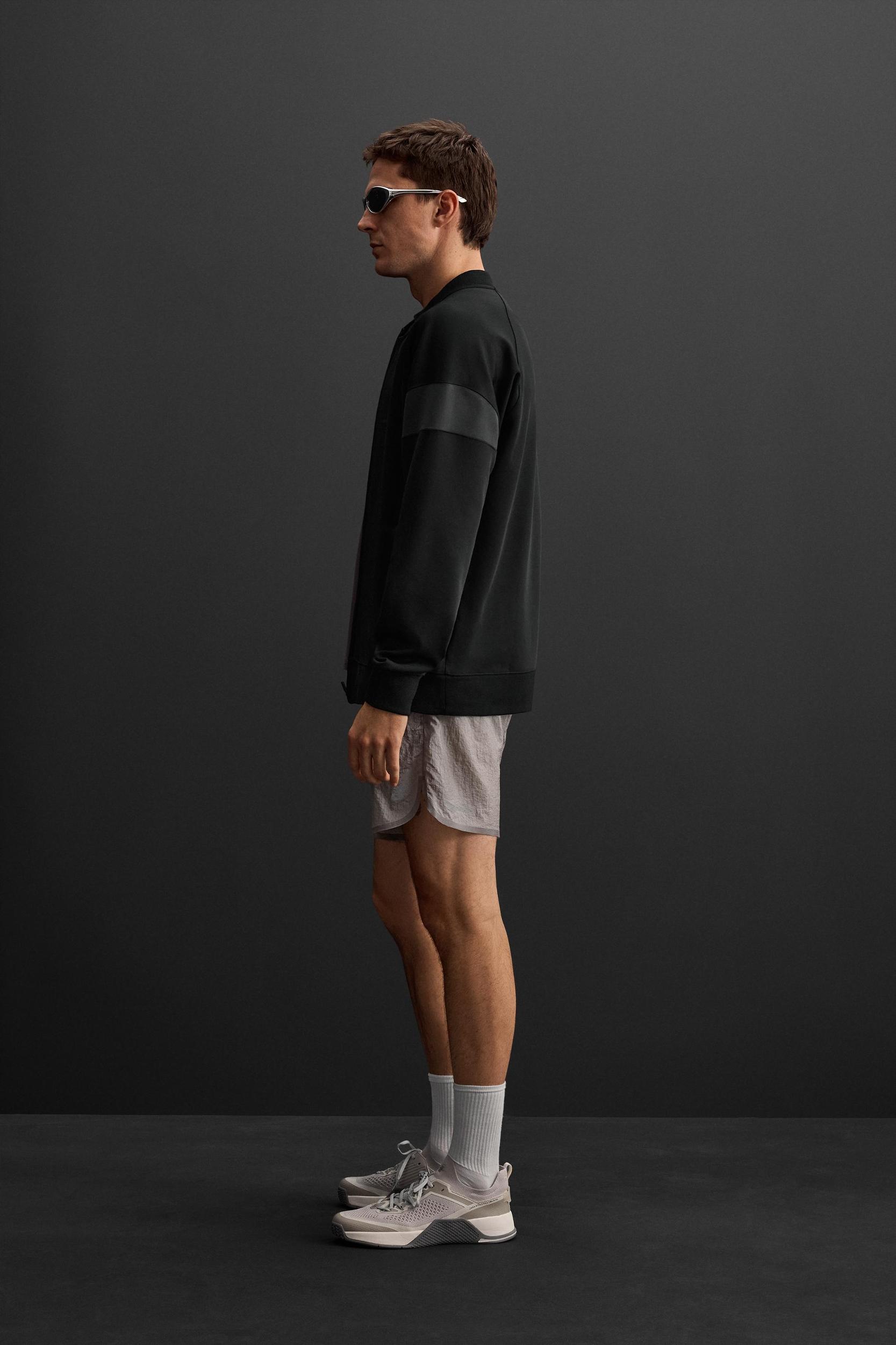TECHNICAL SWEATSHIRT WITH ZIPPER Product Image