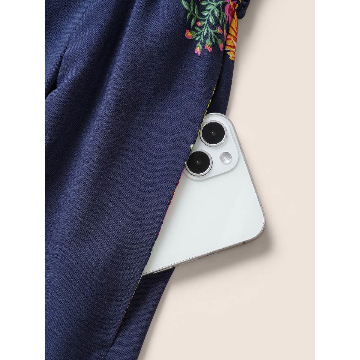 Plus Size Indigo Boho Print Overlap Collar Belted Sleeveless Jumpsuit Women Resort Cap Sleeve V-neck Vacation Loose Jumpsuits BloomChic 14-16/1X Product Image