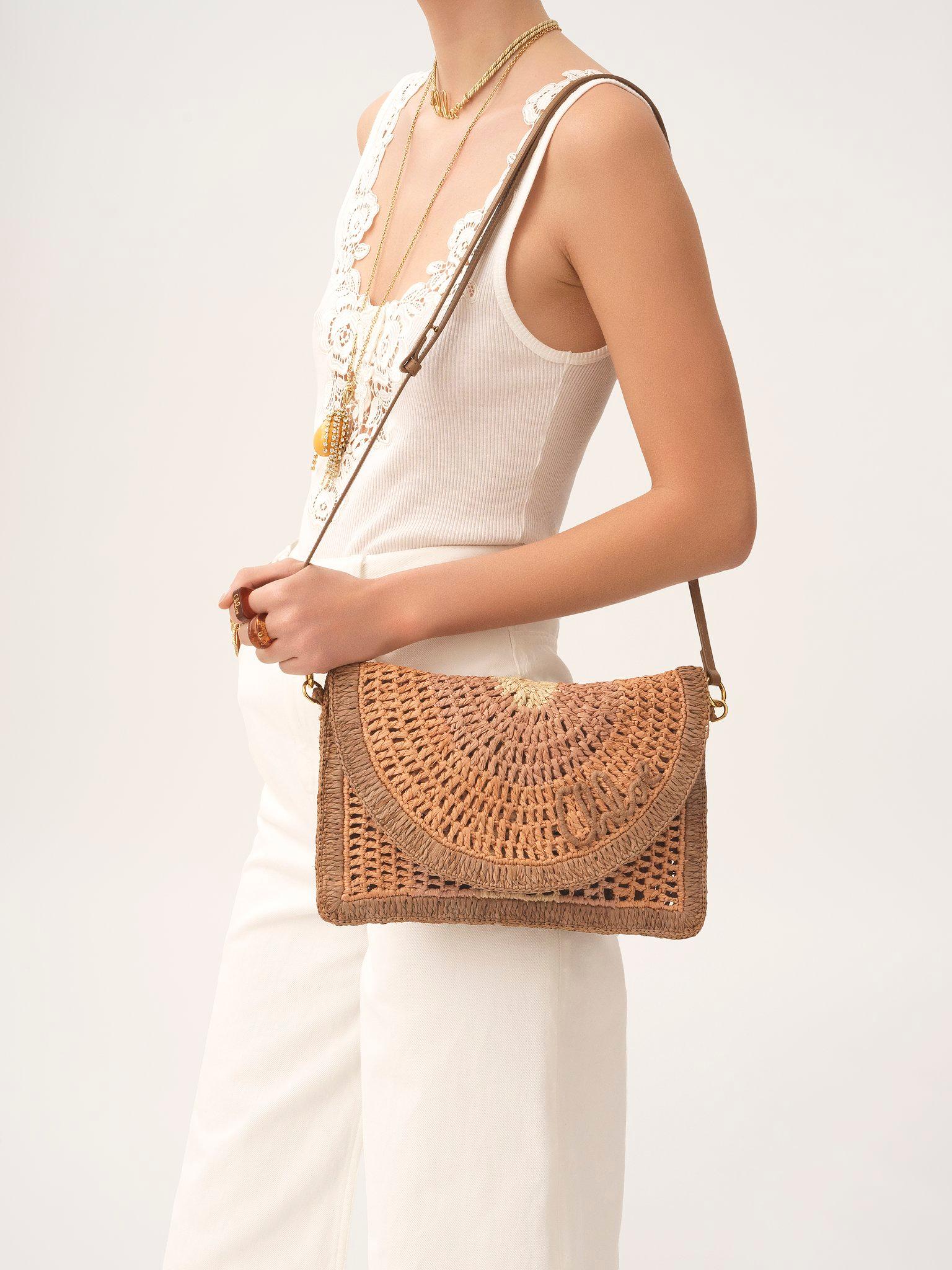 Summer Banana flat pouch with strap in raffia Product Image