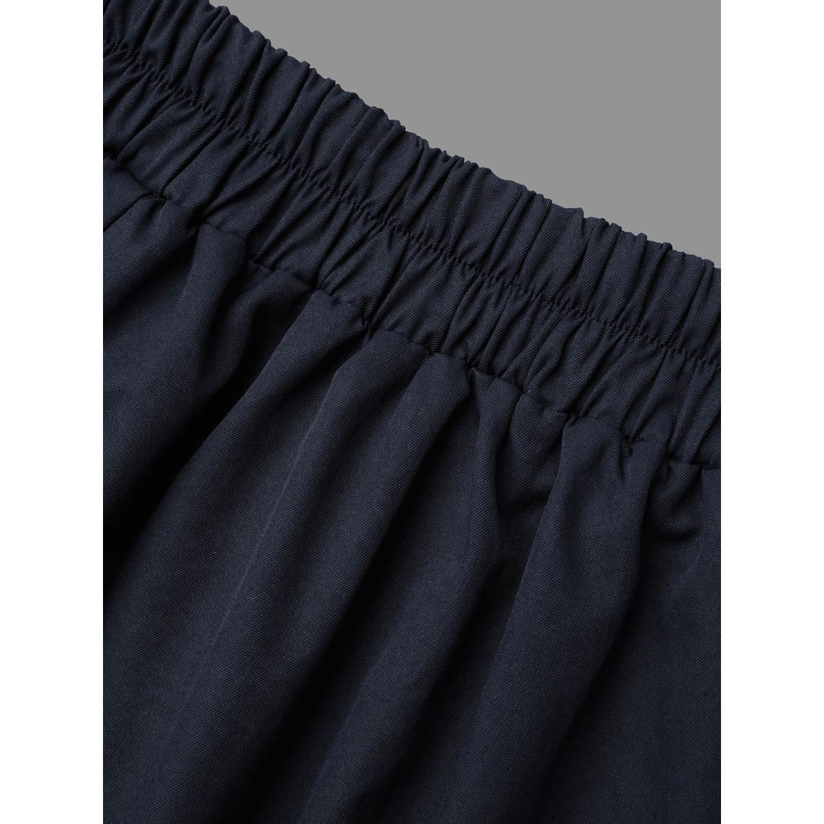 Plus Size Solid Buckle Detail Pocket Skirt Women Indigo Elegant Button Low stretch Slanted pocket Everyday Skirts BloomChic 12/L Product Image