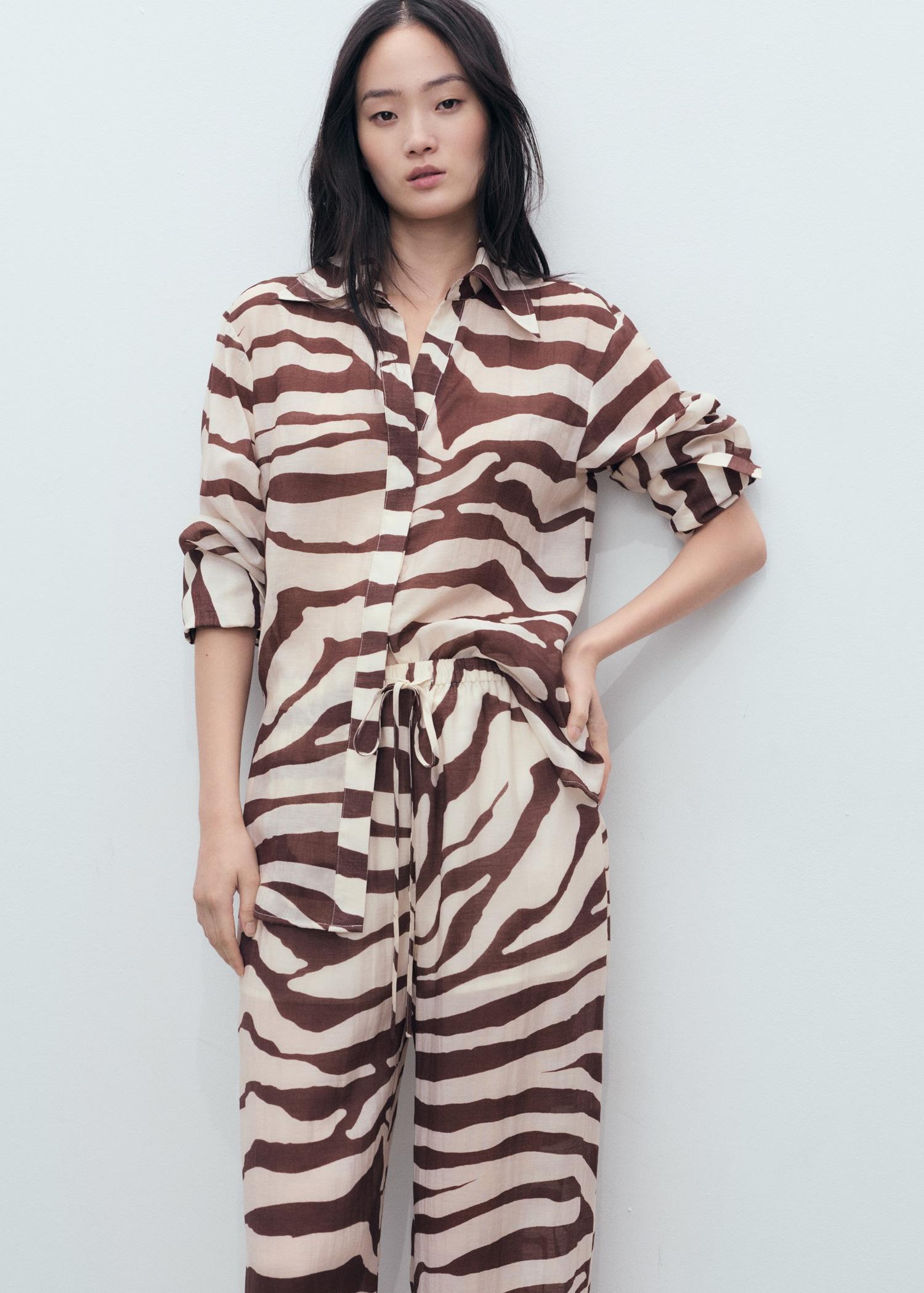 Zebra-print fluid pants - Women | MANGO USA Product Image