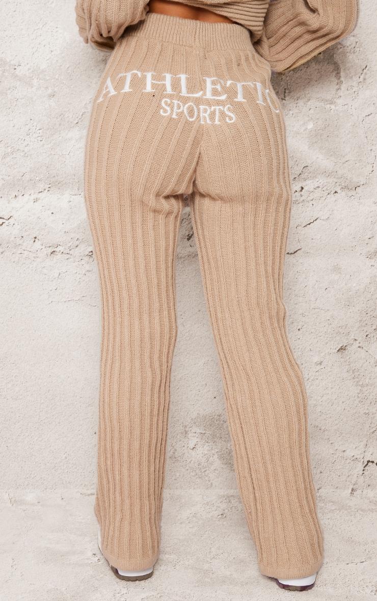 Petite Stone Athletic Sport Embroidered Knit Flared Pants Product Image