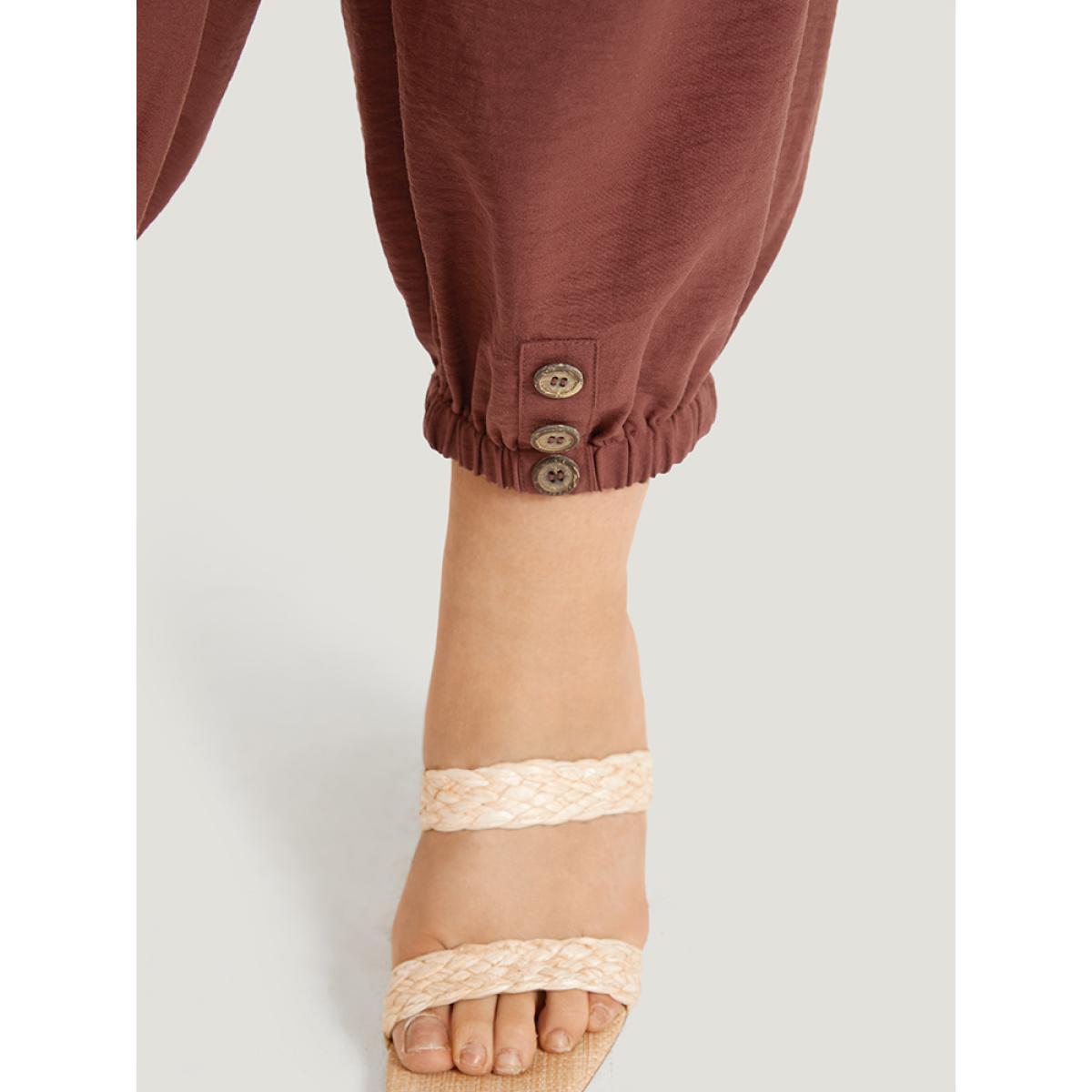 Plus Size Solid Patched Pocket Bowknot Button Detail Pants Women Rust Casual High Rise Dailywear Pants BloomChic 10/M Product Image