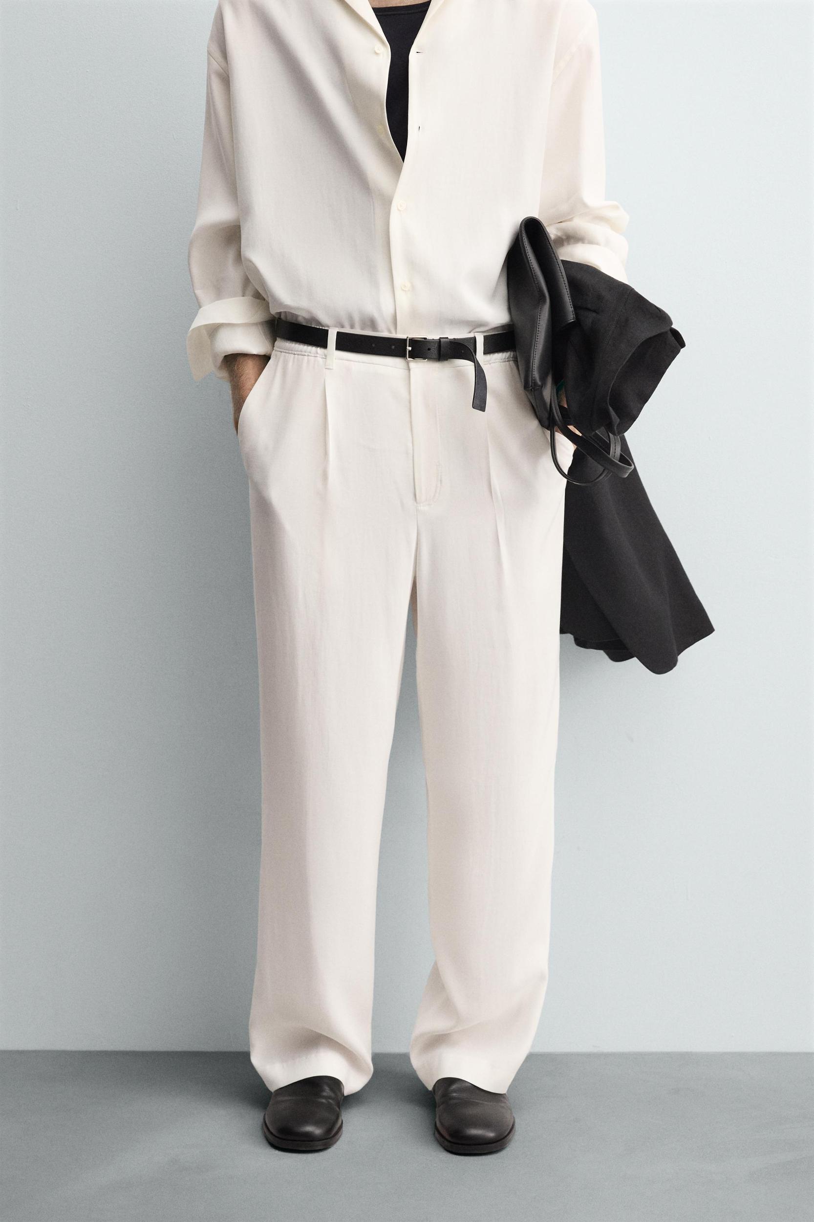 RELAXED FIT PLEATED PANTS Product Image