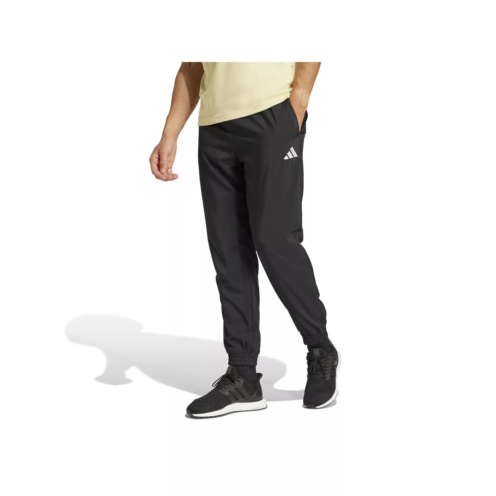 Men's adidas Essentials Small Logo Stanford Sportswear Woven Track Pants,  Product Image
