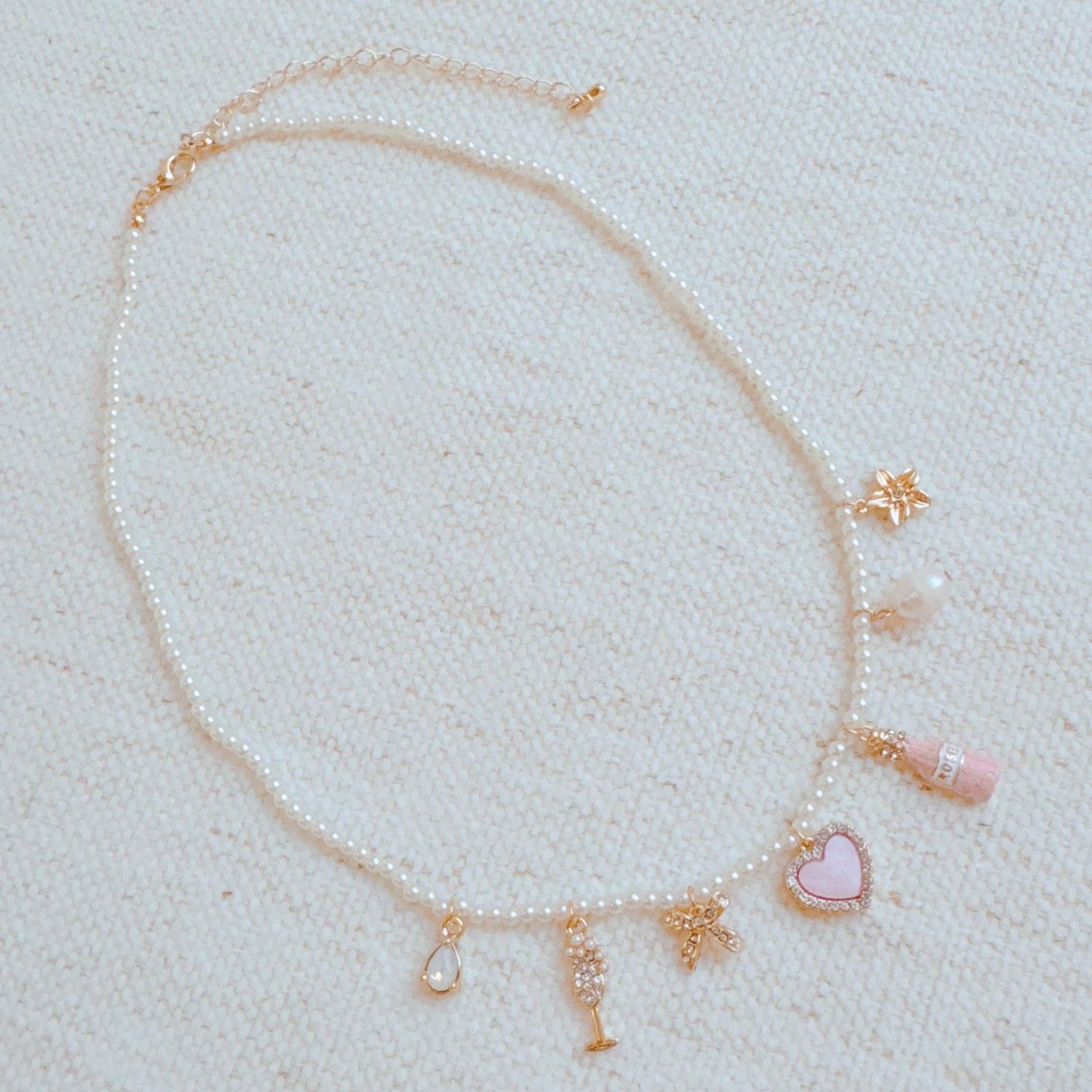 Pink Wink Celebration Multi Charm Necklace Product Image