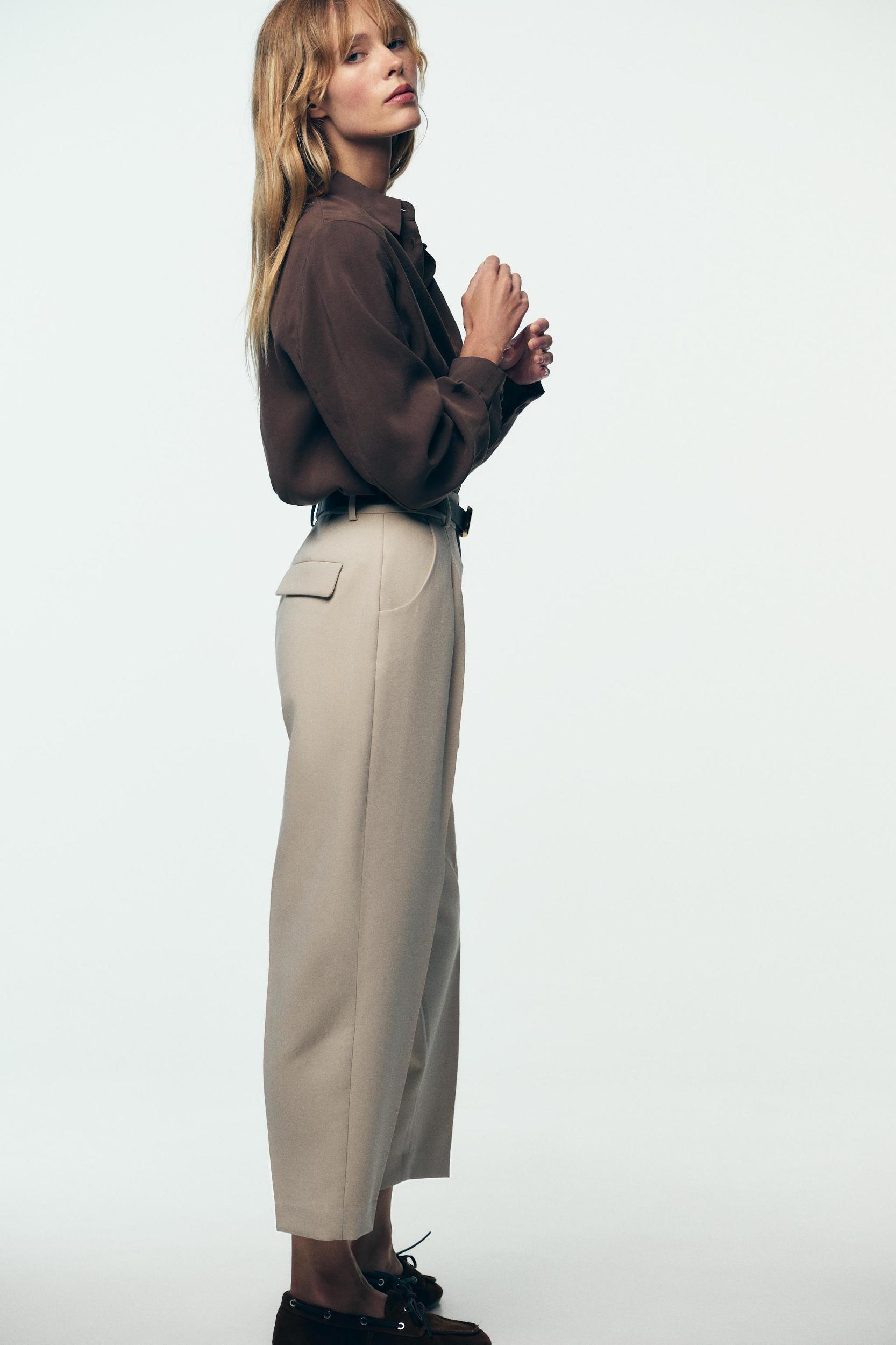BELTED PLEATED PANTS Product Image