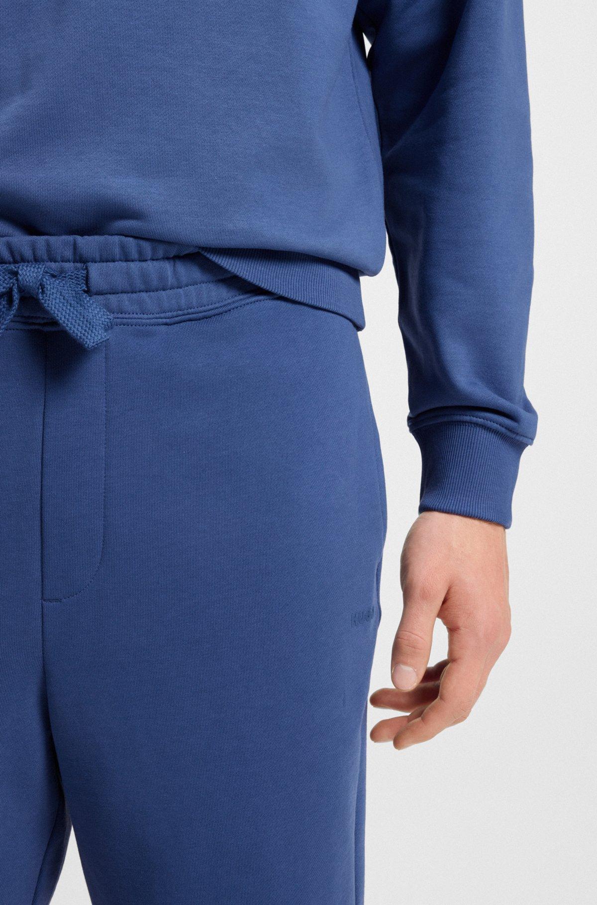 HUGO - Relaxed-fit shorts in cotton terry with logo print - Blue Product Image