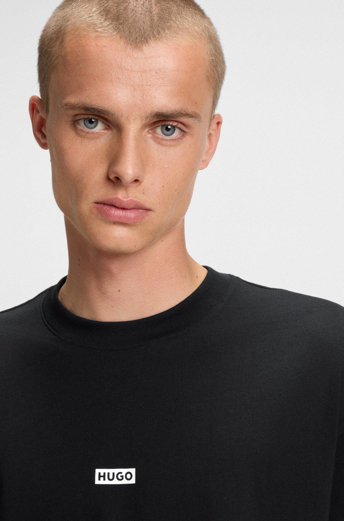 HUGO - Loose-fit T-shirt in cotton with rear logo artwork - Black Product Image