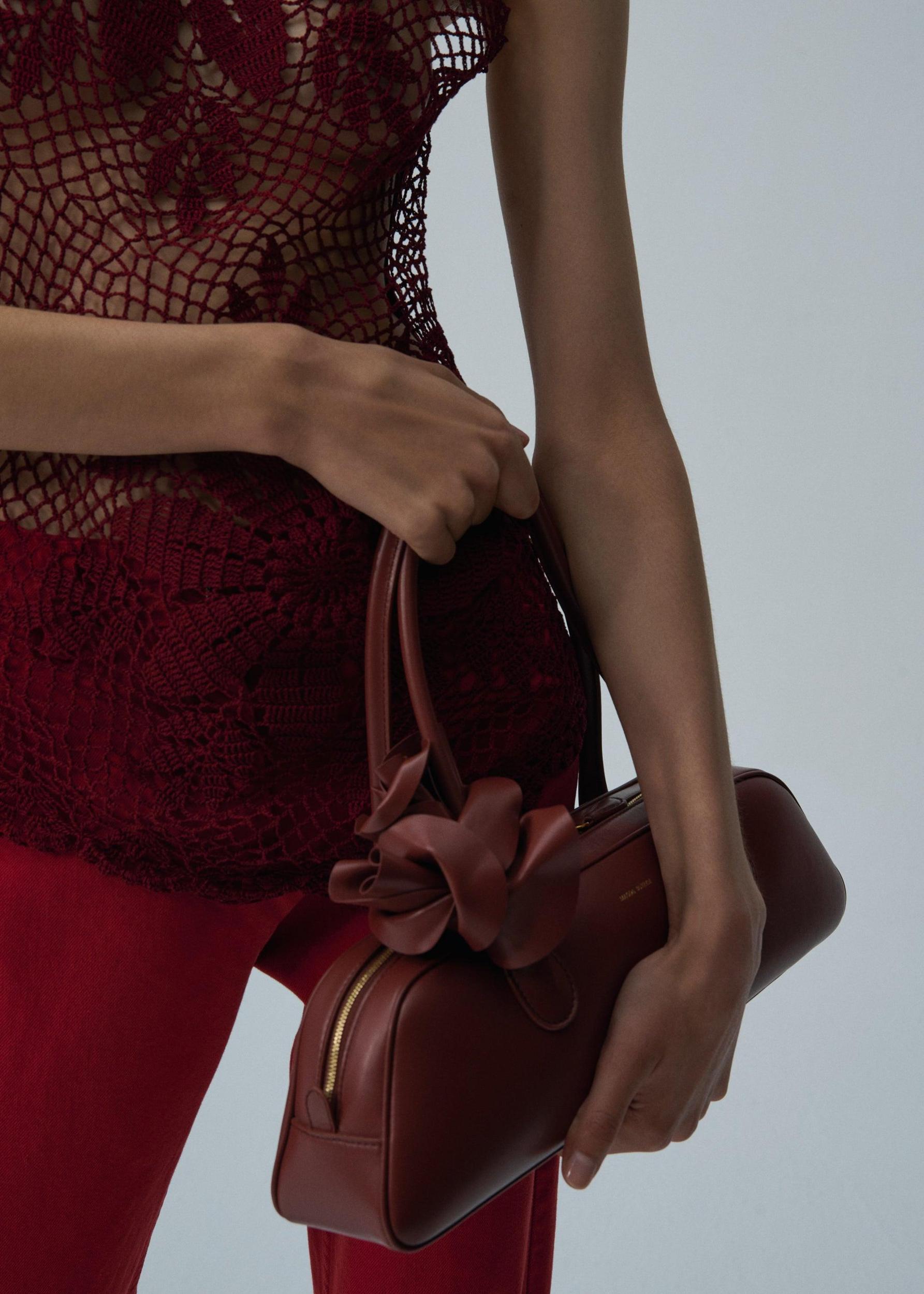 Brigitte trapeze bag in amber leather and gold Product Image