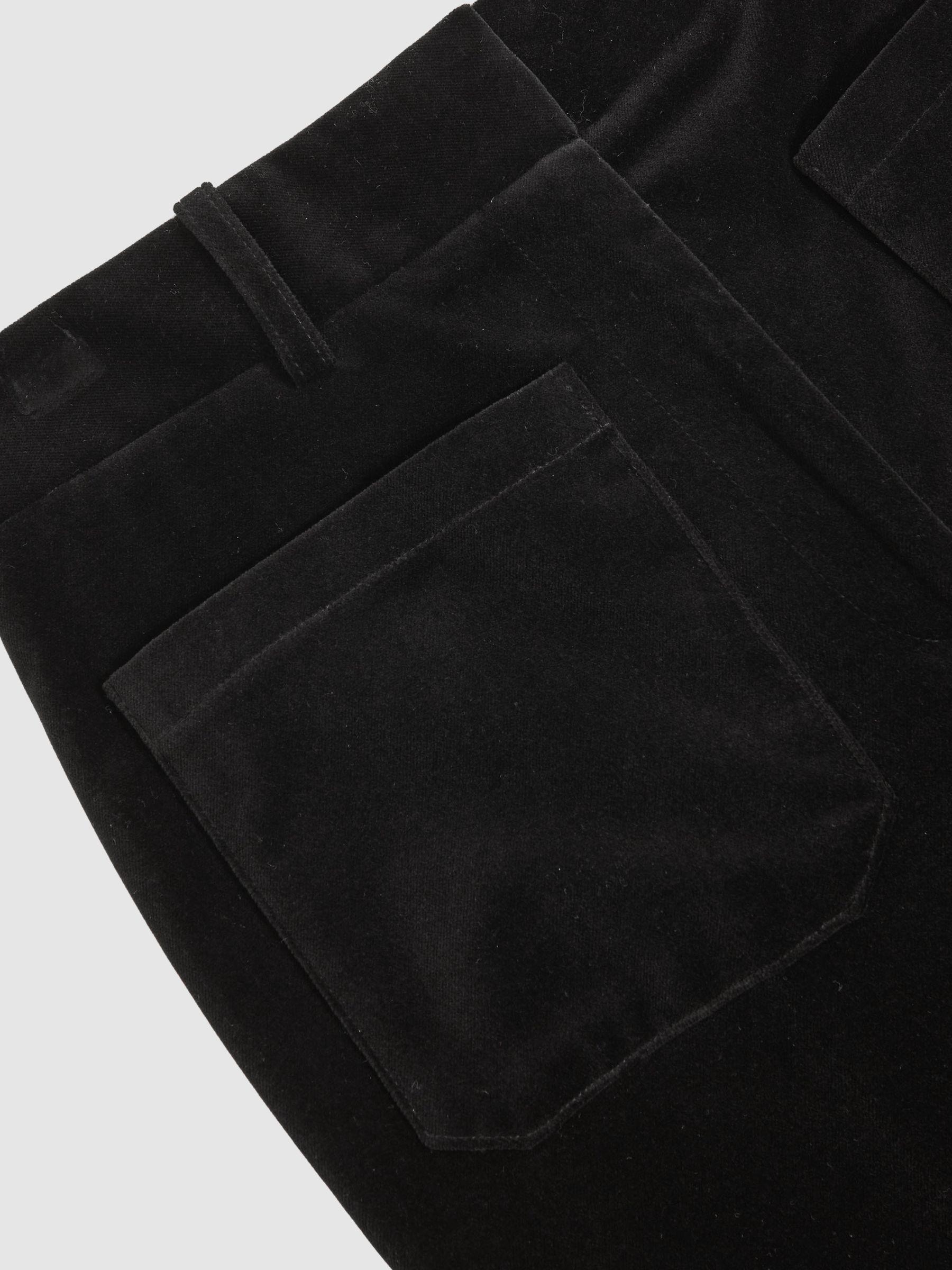 Petite Velvet Flared Trousers in Black Product Image
