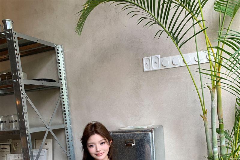 Sleeveless Round Neck Floral Print Top / High Rise Wide Leg Pants Product Image