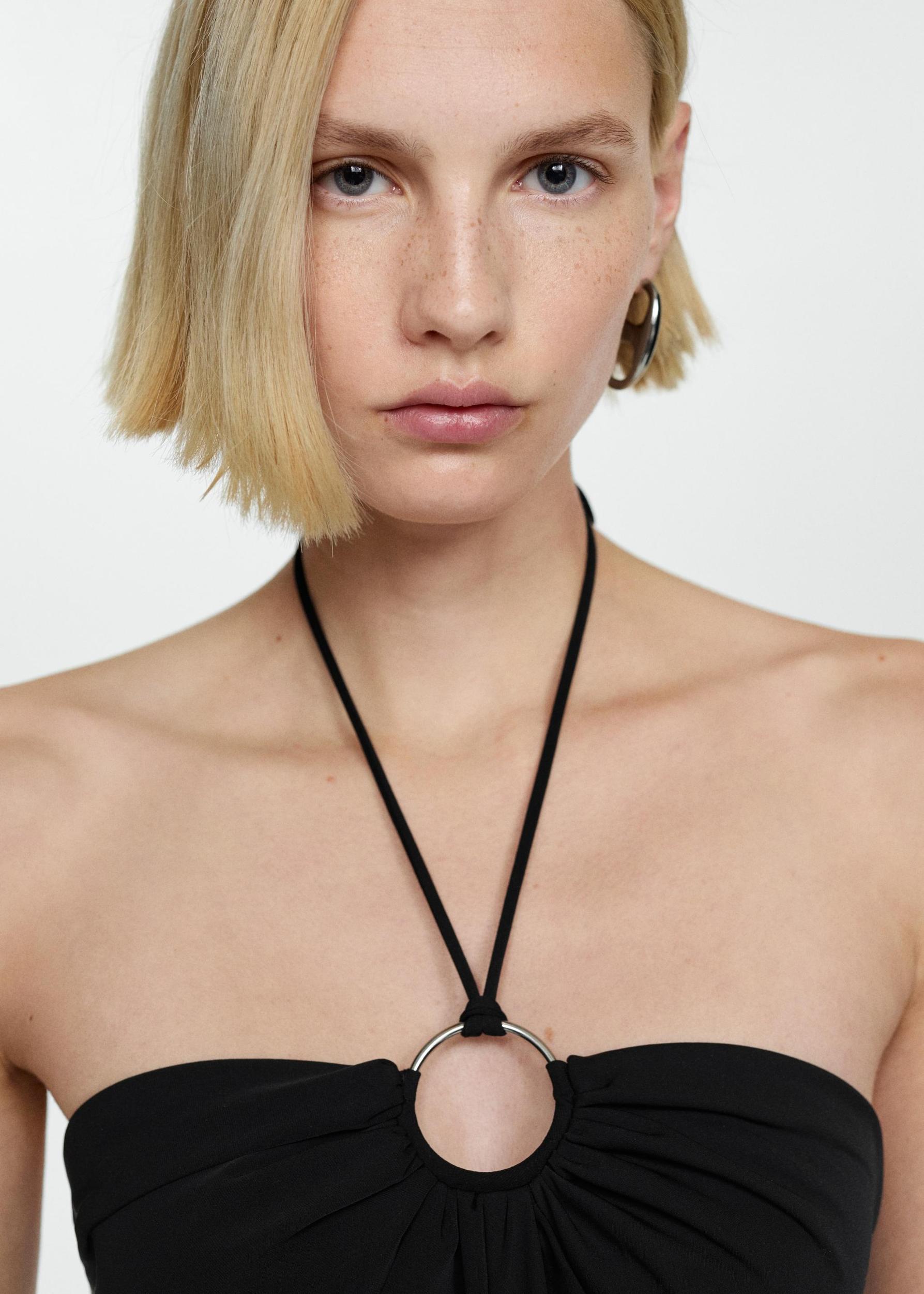 Halter-neck jumpsuit with ring - Women | MANGO USA Product Image