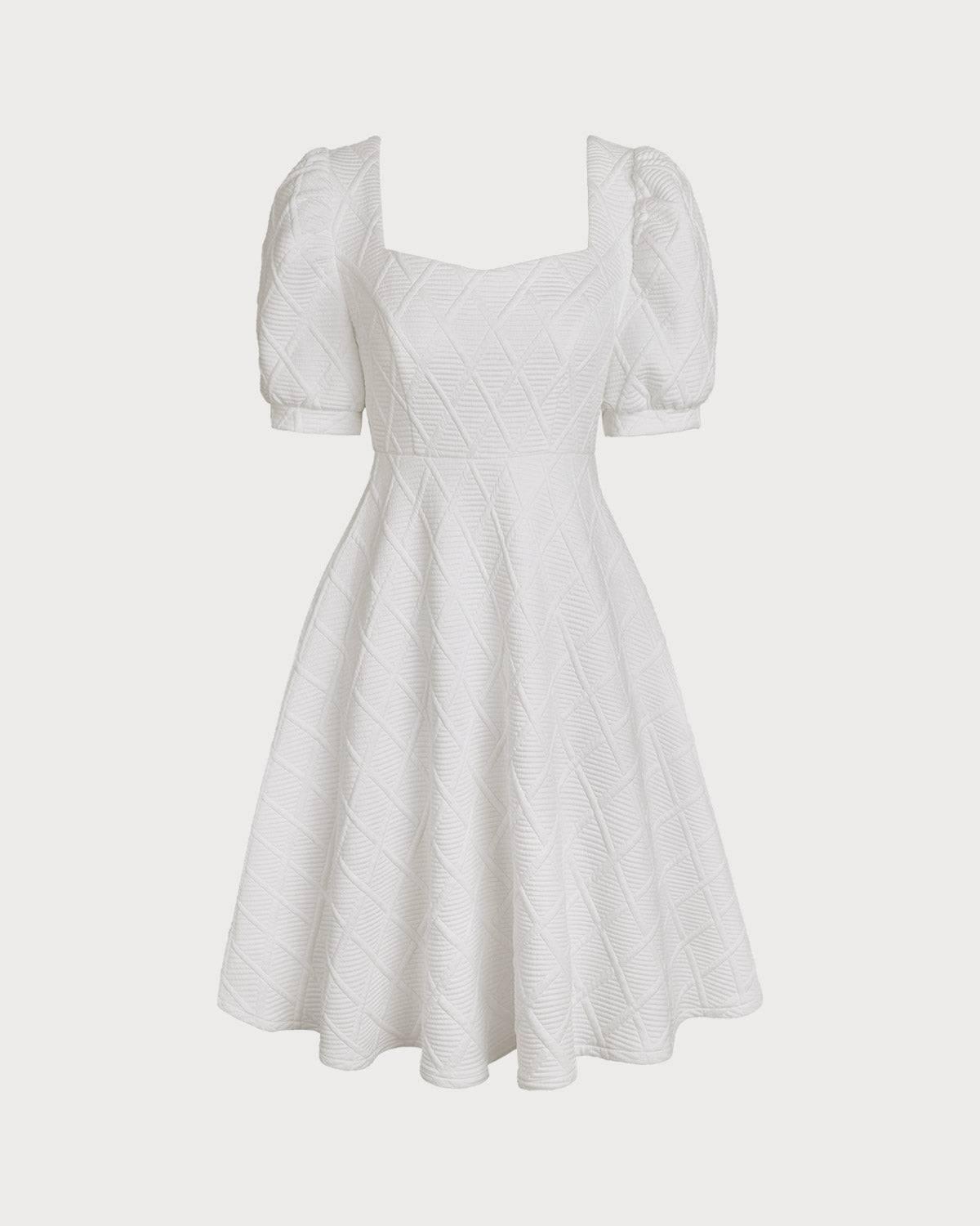 The Solid Textured Puff Sleeve Mini Dress Female Product Image