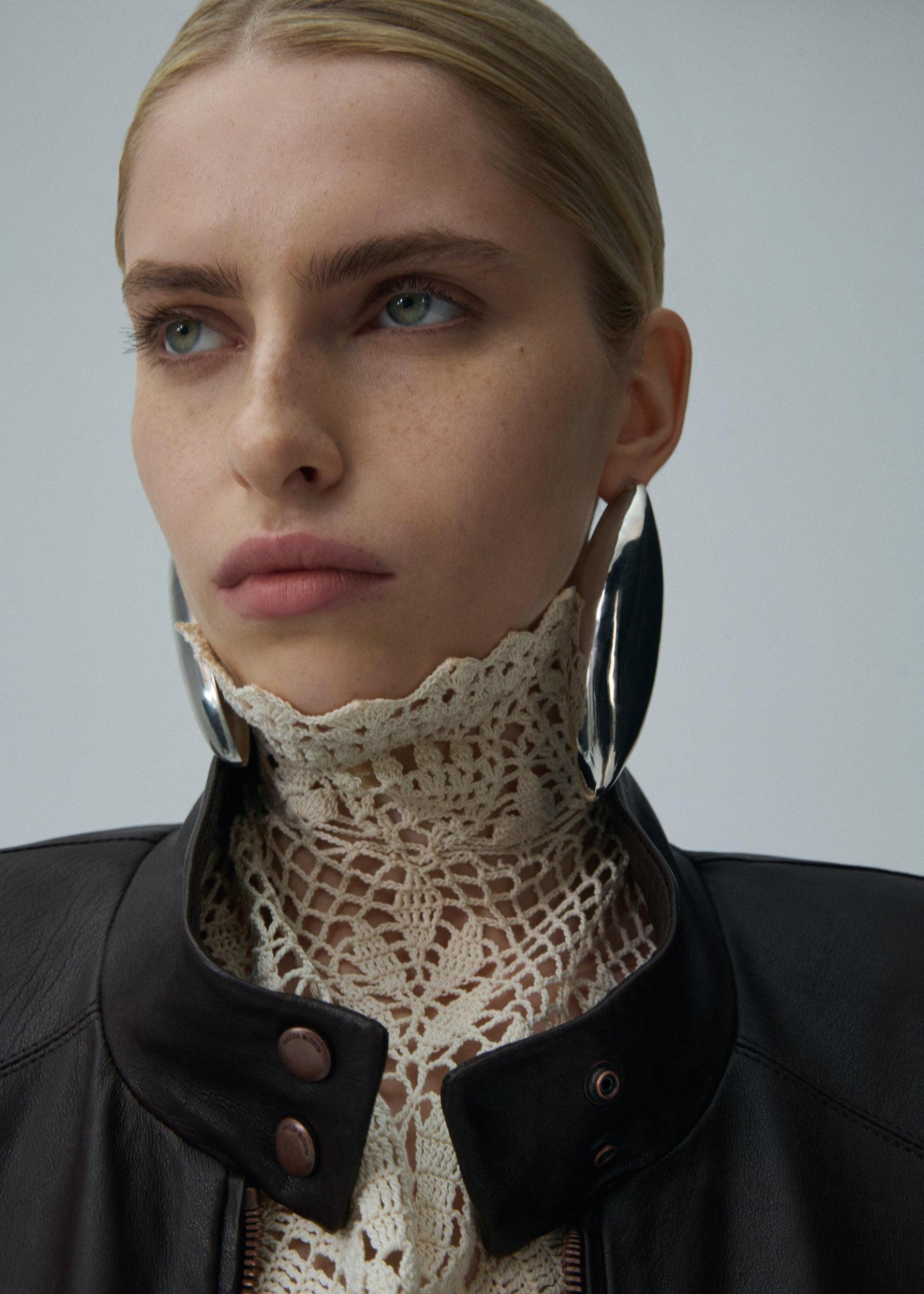 Cropped leather bomber jacket in brown Product Image