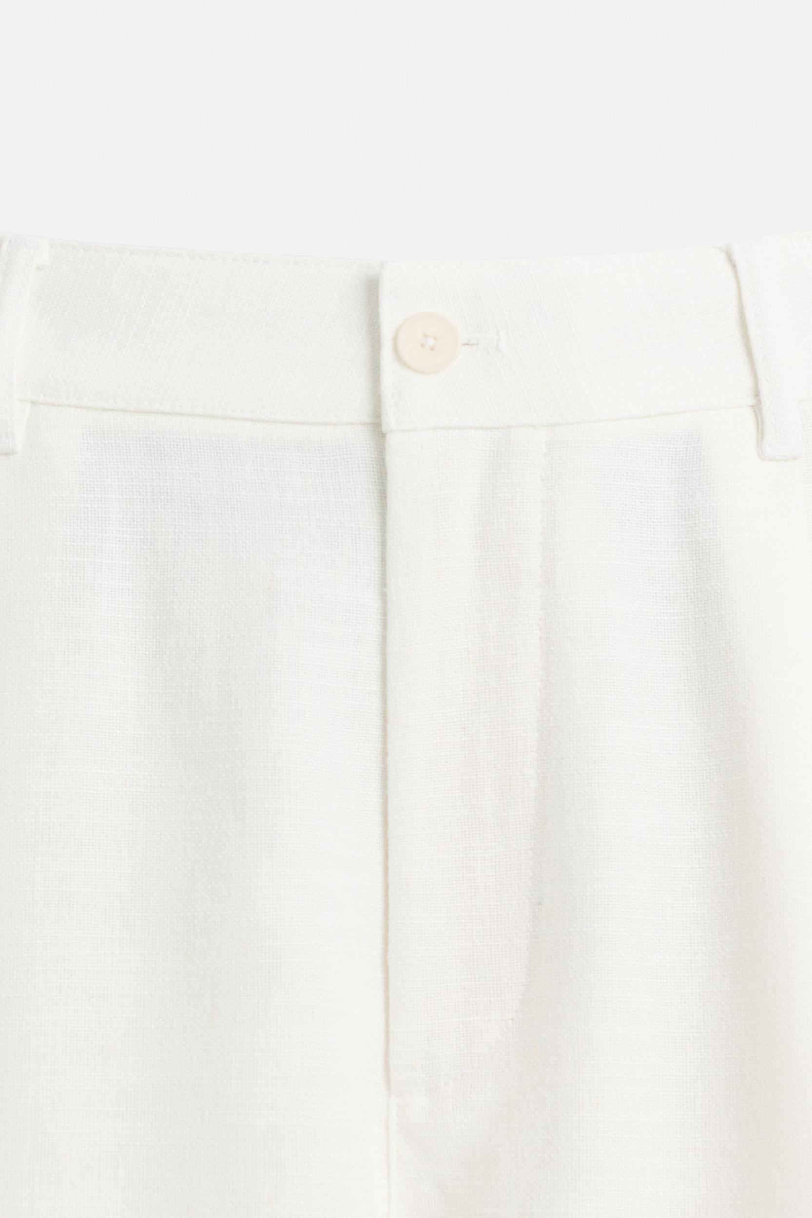 PLEATED RELAXED FIT PANTS Product Image