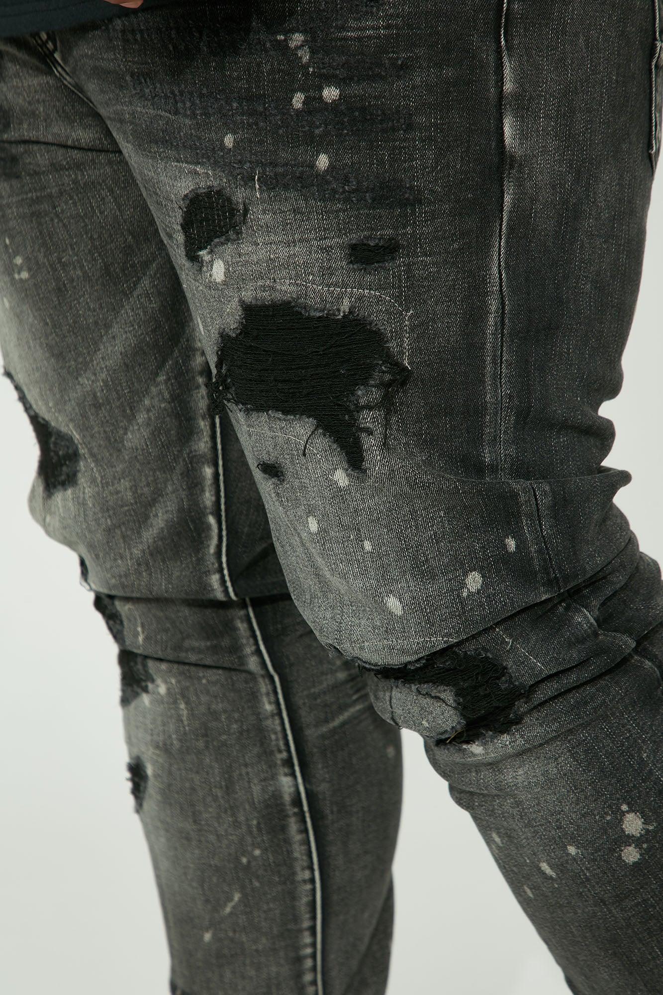 On The Spot Ripped Stacked Skinny Jeans - Black Product Image