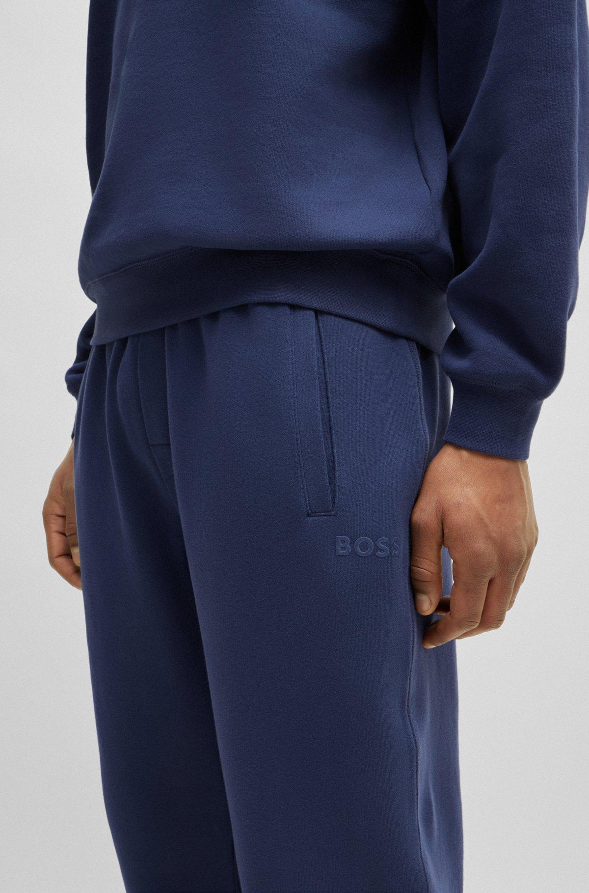Cotton-terry tracksuit bottoms with flocked logo Product Image