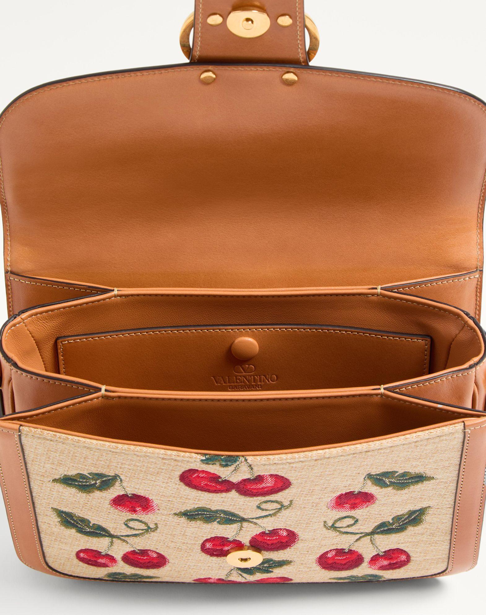 Valentino Garavani 9To5 Shoulder Bag In Jacquard Raffia With Cherryfic Motif Product Image