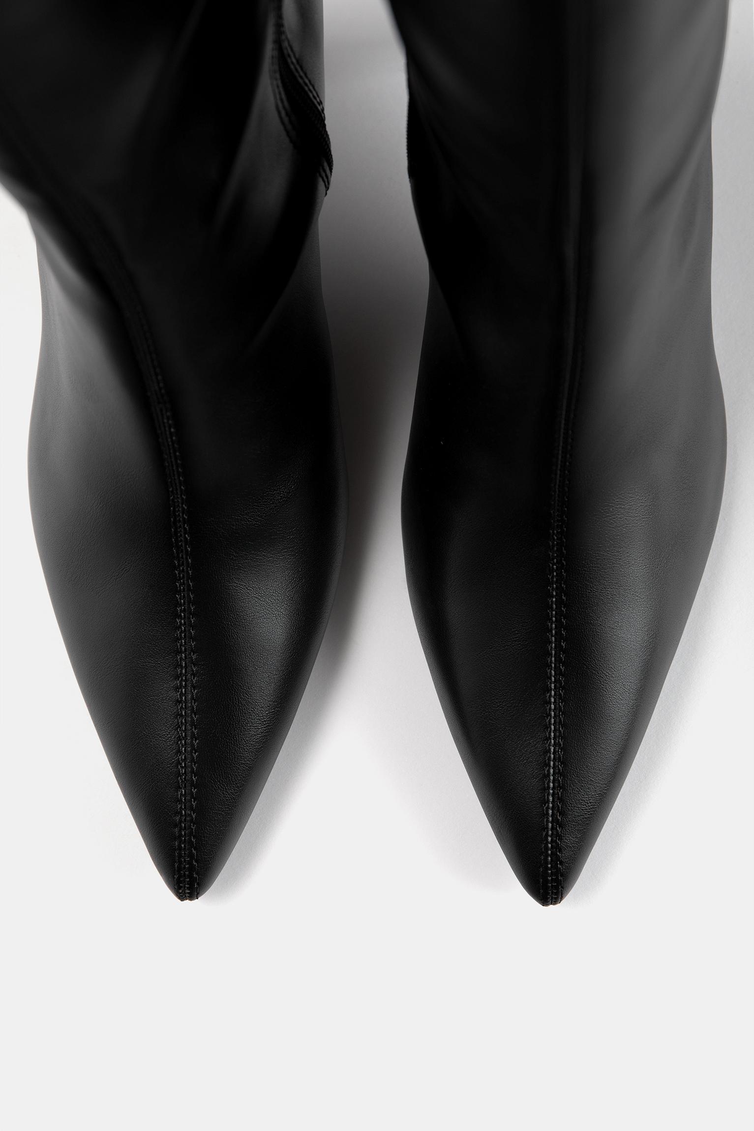 Stiletto heel knee-high boots Product Image