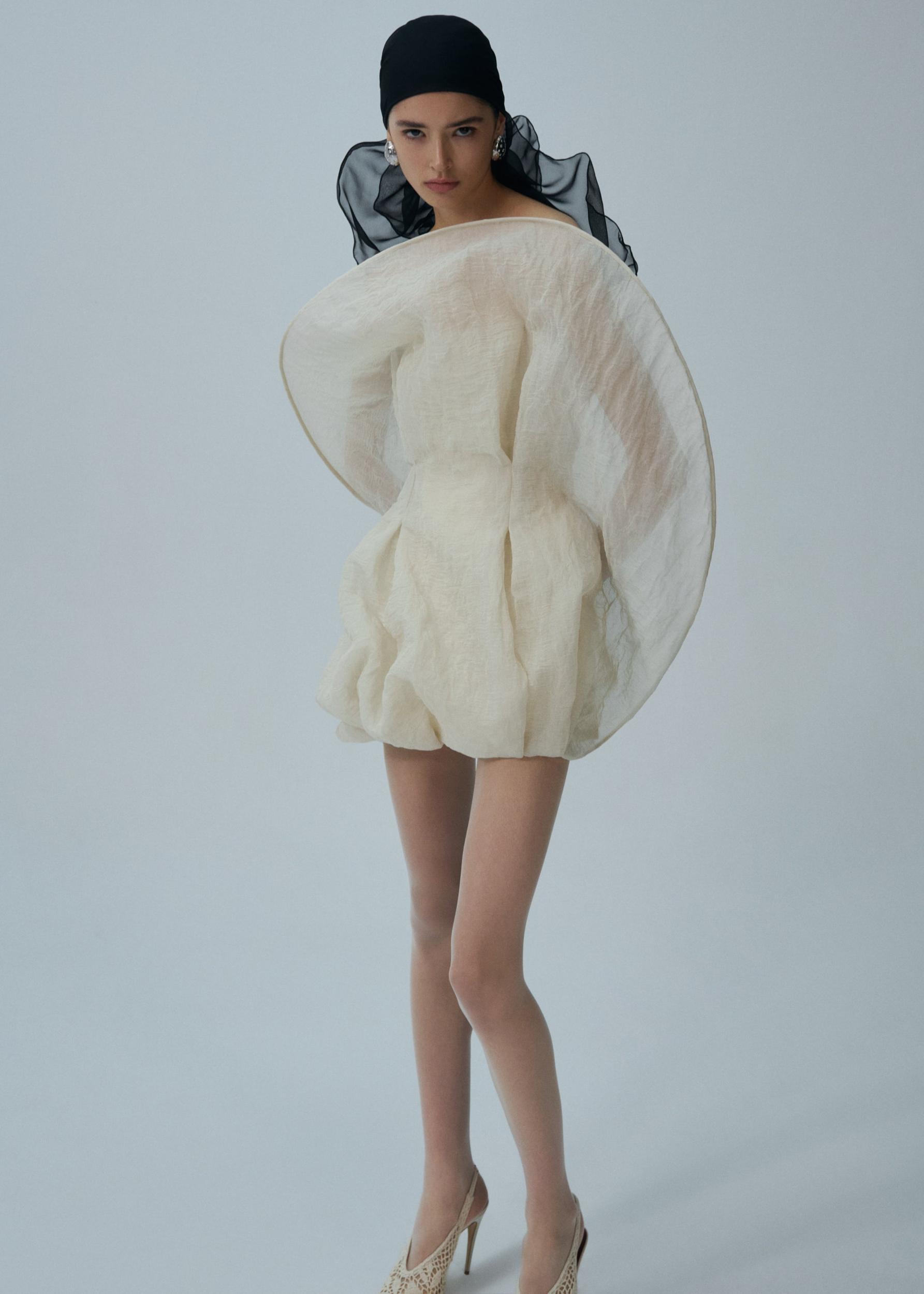 Strapless sculptural mini dress in beige Product Image
