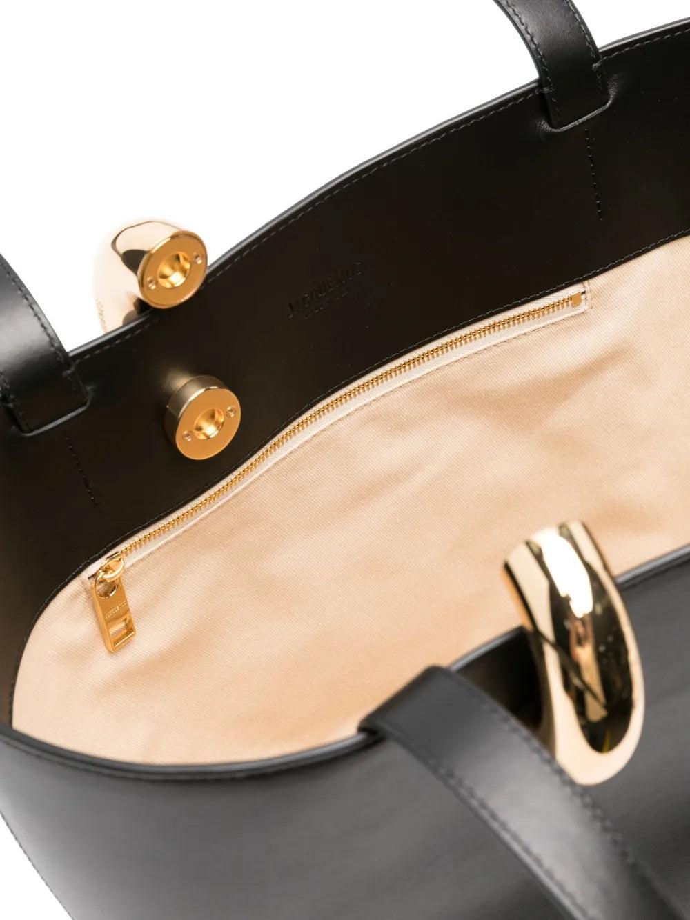 JACQUEMUS The Medium Bambola Asymmetric Leather Bucket Bag In Black 990 Product Image