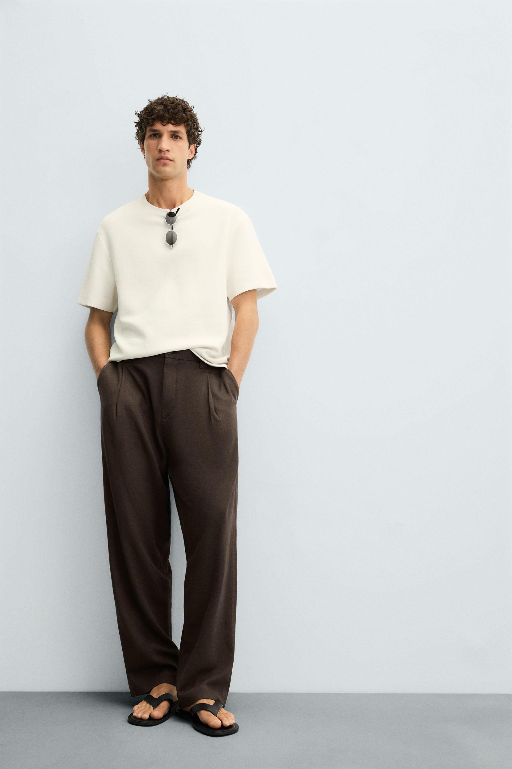 FLOWY PLEATED PANTS Product Image