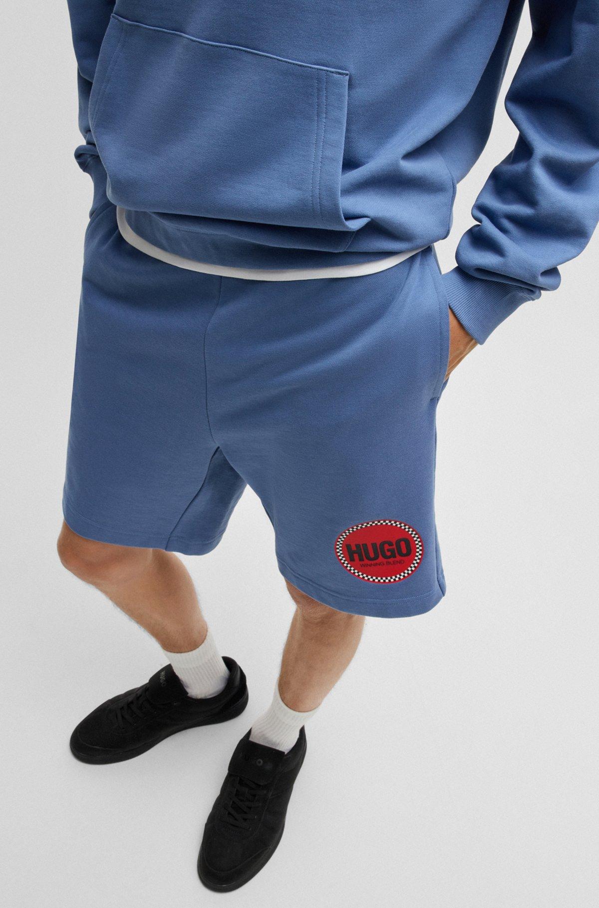 Cotton-terry relaxed-fit shorts with logo print Product Image
