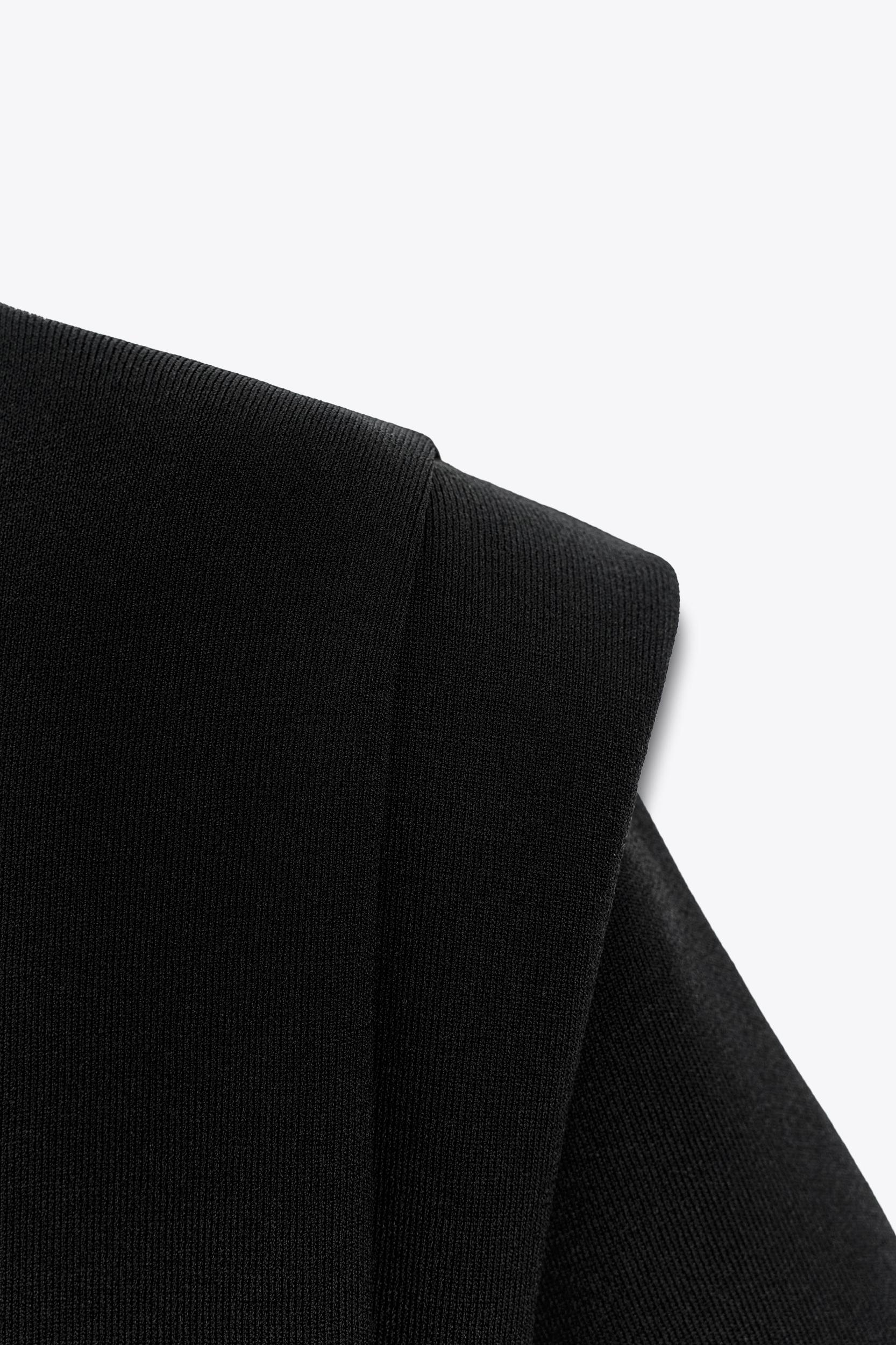 SHOULDER PAD KNIT TOP Product Image