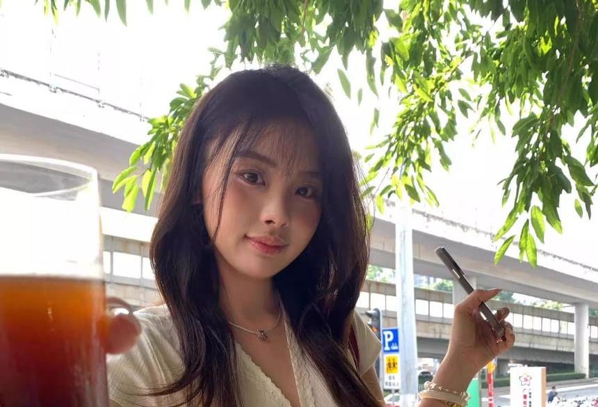 Short Sleeve V-Neck Plain Lace Panel Ruffled Hem Slim-Fit Blouse Product Image